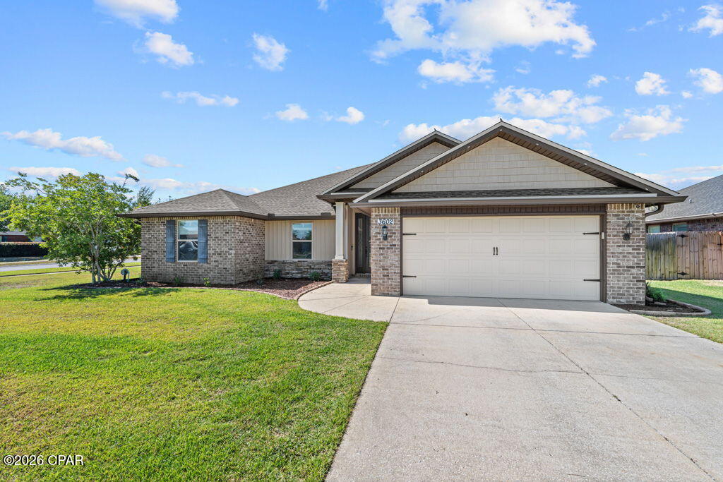 Welcome to 3602 Azalea Court!  A beautifully maintained 4-bedroom, 2-bathroom home offering over 1,900 square feet of thoughtfully designed living space. This fully brick home sits on a private corner lot with an extremely low HOA and a fully fenced backyard, perfect for relaxing or entertaining.  Step inside to find a bright, open layout with a split floor plan and vaulted ceilings in the living room, complete with a cozy electric fireplace. The kitchen is light and airy, featuring quartz countertops, upgraded lighting, stainless steel appliances, a stunning tile backsplash, self-closing drawers and cabinets, and a large center island ideal for gathering.  The spacious primary suite offers a true retreat with an en suite bathroom that includes a double vanity, soaking tub, and separate shower. Additional features throughout the home include hardwood floors, elegant wainscoting, gutters, and extra storage with pull-down attic access in the garage.
This home combines comfort, style, and functionality in a desirable setting don't miss your opportunity to make it yours!