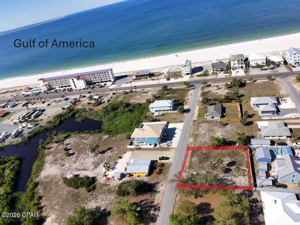 Large residential lot located in the heart of Mexico Beach. Lot measures 100' x 100' and is level, cleared and in the desired X Flood Zone. Build up and have a Gulf View. Tap Fee Paid. One half block to the beach and one block to the City Park with pickle ball, tennis court, playground and social area. Mexico Beach is Golf Cart friendly. Shops & restaurants within walking distance. Miles of beach to explore and sunsets to enjoy. Great location in Mexico Beach!!