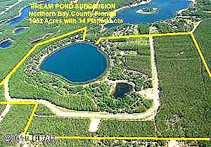 BREAM POND 1.9 ACRE LOT-OWNER FINANCING AVAILABLE-10% DOWN/20 YEAR AMORTIZATION/9% INTEREST/5 YEAR BALLOON-ATTENTION BUILDERS and DEVELOPERS - This is a Dream Property ready to BUILD-OUT. 40 separate parcels in a complete Subdivision surrounding and including Bream Pond in Northern Bay County. All Platted, Paved Roads, Underground Electric. With all of the recent Growth in the Sand Hills portion of Northern Bay County, this property is ready-to-go. This property is about 1/2 mile East of Hwy 77 and 1/2 mile South of Hwy 20 making it a very convenient location. Bream Pond is a Beautiful approximately 30 Acre Lake that is known for it's fishing. It has clean clear water and a white sand lake bottom making it a desirable Lake for swimming, kayaking , jet-skis and other water activities.