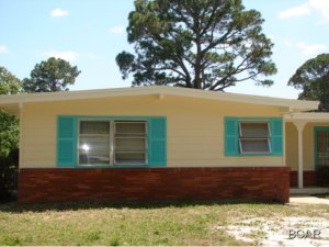 Beautiful, 3 bedroom 2 bath water front home with wood burning fireplace with formal dining area and family room. Home has great curb appeal with a beautiful front porch and spacious back deck over looking canal. This spacious home also includes large fenced yard, carport with storage area, and utility room.