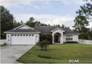 Breezy living. This extraordinary split-bedroom ranch has the space and comforts you're looking for. Whether enjoying your time on the screened patio, owner's spa retreat, or pond-side fishing deck, you'll be living the lifestyle you've dreamed of! The open kitchen with raised bar top is perfect for entertaining. Vaulted ceilings in the main living room and tray ceilings in the Master Bedroom add to airy feel. Located near schools, parks, and golf courses.