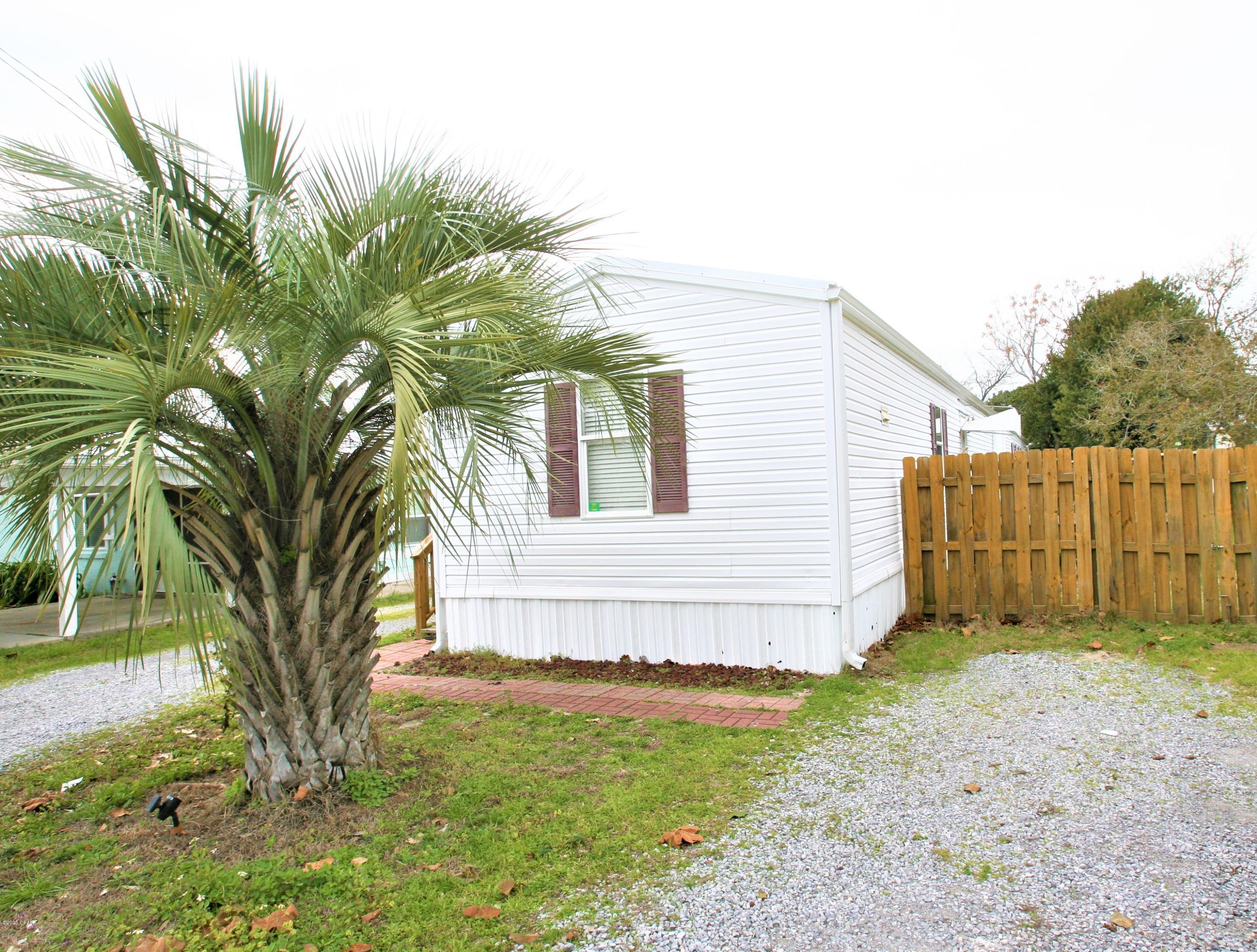 Live close to everything in the West End of Panama City Beach!  Minutes from the beach (one block!), Pier Park, dining, shopping, and more. Fenced in back yard with gazebo. Cute kitchen with laundry. W/D included. Updated bathroom. Zoned for West Bay Elementary School, Surfside Middle School, and J.R. Arnold High School.  $1250/month.