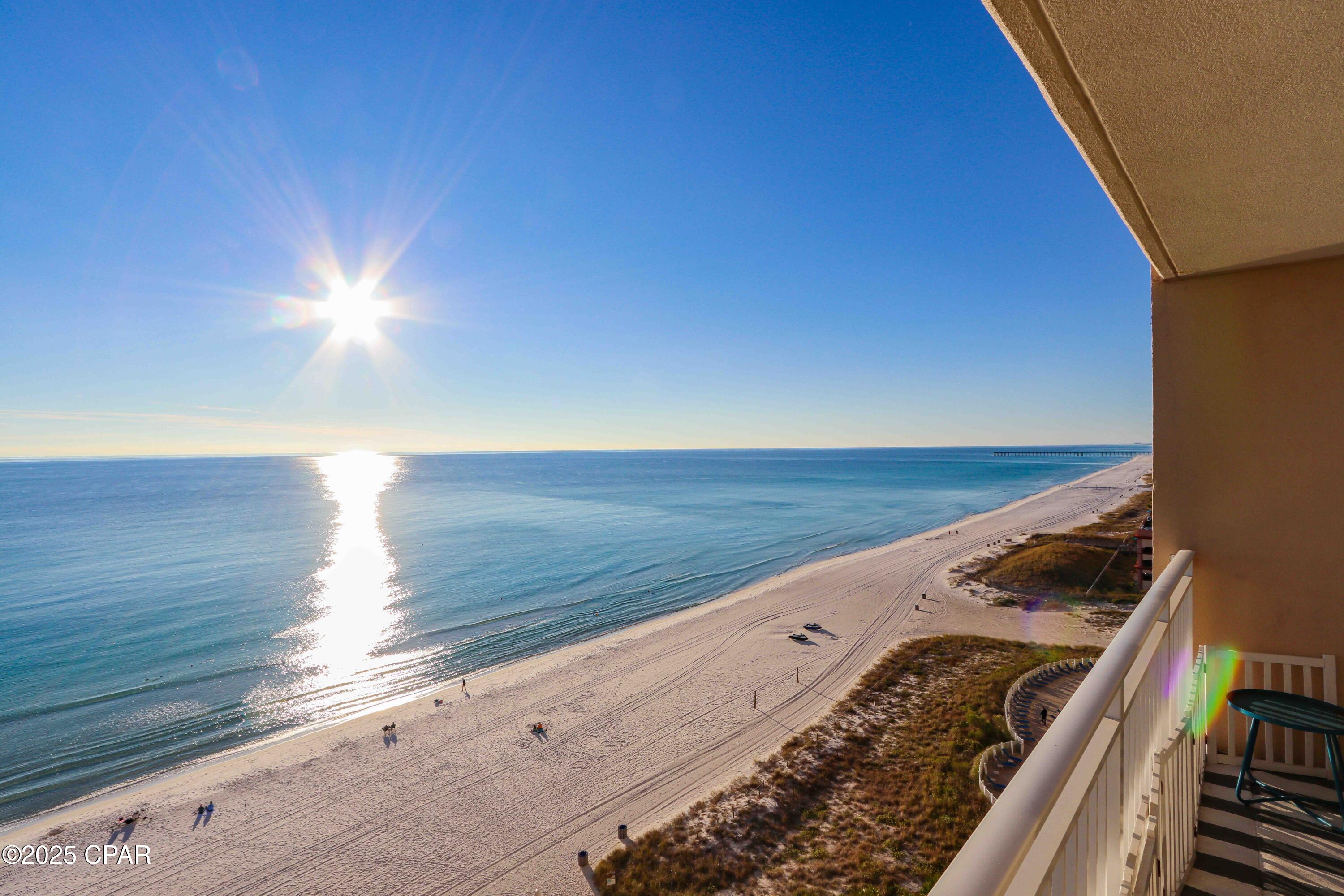 Experience Gulf-front living at Emerald Beach Resort with this beautifully maintained, fully turn-key condo offering stunning views, strong rental history, and exceptional resort amenities in one of Panama City Beach's most desirable beachfront locations. Unit #1132 presents an outstanding opportunity for buyers seeking a proven income-producing property that is already established and ready for continued vacation rental success from day one.

This spacious one-bedroom plus bunk floorplan is designed to maximize both comfort and rental appeal, with documented gross vacation rental income totaling approximately $37,418. The condo has been successfully operating as a vacation rental and is fully positioned for its next owner to immediately continue rentals, personal enjoyment, or both.

Step onto the oversized private Gulf-front balcony and enjoy sweeping panoramic views of emerald-green waters, sugar-white sand, and unforgettable sunsets. Positioned on an ideal mid-level floor just above the dunes, the condo offers a perfect balance of privacy while still maintaining a strong connection to the beachfront setting below.

Inside, the open-concept layout is bright, inviting, and thoughtfully designed for coastal living. Gulf views extend through the main living area and primary bedroom, while the bunk area provides additional accommodations that enhance guest capacity and overall rental functionality.

Emerald Beach Resort is one of Panama City Beach's most recognizable and sought-after resorts, known for its vibrant atmosphere and extensive amenities, including Gulf-front lagoon pools, hot tubs, beachfront tiki bar, children's splash area with snack bar, game room, activity center, fitness center, Sky Bar with seasonal entertainment, on-site Starbucks, Sunsations retail shop, full-service spa, and secure covered parking with Sky Bridge access.

Conveniently located near Pier Park and popular local favorites including Sharky's, Runaway Island, and Dusty's, the resort also offers quick access to Frank Brown Park, Pirates Voyage Dinner & Show, shopping, entertainment, and designated dog-friendly beach areas.

Whether you're searching for a personal beachfront retreat, a second home, or a proven investment property with established rental performance, this Emerald Beach Resort condo delivers the ideal combination of location, lifestyle, and immediate income potential along one of Panama City Beach's most sought-after stretches of shoreline.