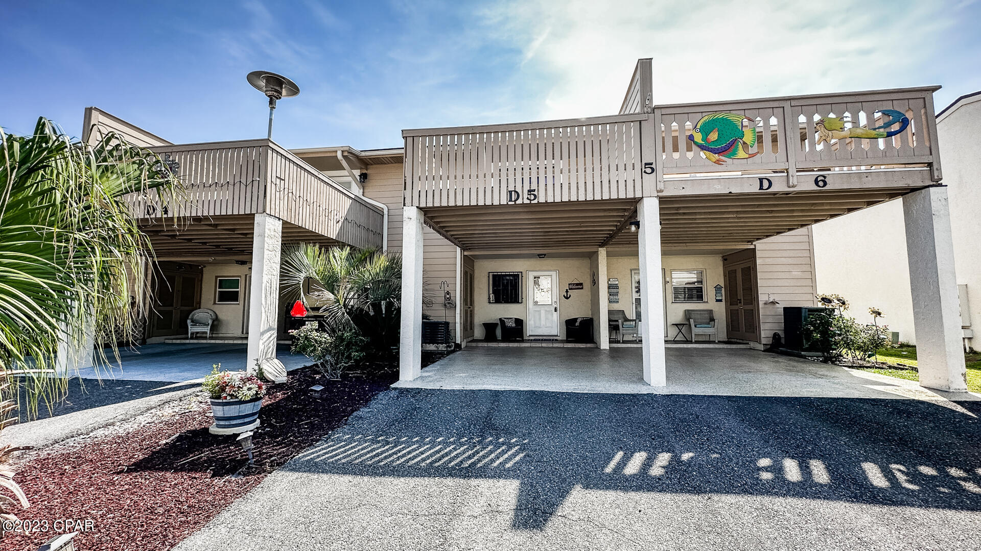 LOCATION, LOCATION, LOCATION!!!  This beautiful 2BR/2.5BA condo has SO much potential to ''make it your own'' and is a short distance to the beach (approx. 500 steps) to the dedicated beach access. It is also one of the few in Horizon South with a covered carport & back yard.  In addition, this unit is equipped with with (2) decks, front and back, and boasts a beautiful back porch & yard, convenient for owner dog lovers. Updates include; HVAC, Sliding Glass door downstairs, new mattresses for both beds, fan/vent replaced in downstairs bathroom & front window replaced. Horizon South Condominiums is located on the West-end, convenient to 30A & less than 2 miles from Pier Park.  Horizon South is known for their many amenities including; 4 pools, hot tub, a kiddie pool, tennis courts/pickleball, shuffle board, fitness center,18 hole mini-golf, game room & more.  Short term rentals allowed.  *Measurements are approx. and should be verified).
