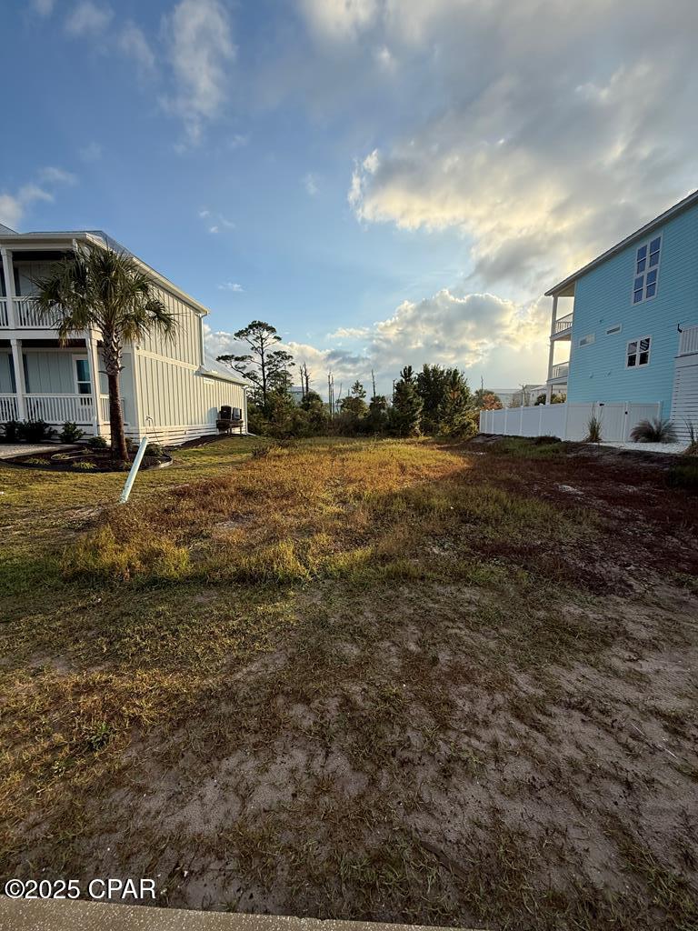 Great building lot with gulf views in the gated and established beach community of Villa Del Sol. Villa Del Sol is a bustling beach front master planned subdivision with dedicated beach and bay access, community pool, TWO pickleball courts, gated entry, brick paver streets with ribbon curbing, reasonable restrictions and association fees, and much more. Villa Del Sol is located at the beginning of Cape San Blas near Salinas Park (driving access point) and only 10 minutes to Port St Joe and 20 minutes to Apalachicola.
