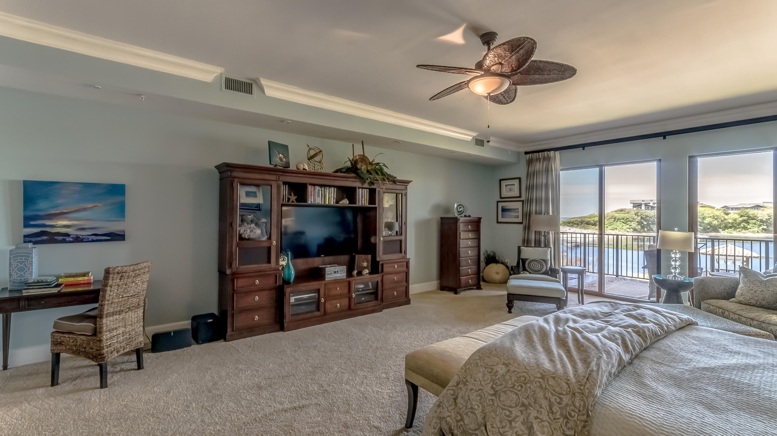 'CURRENTLY UNDER CONTRACT, SELLER ACCEPTING BACKUP OFFERS 'Walking through the door, you immediately know you've found that special place that you have been searching for... and when you walk into the great room and find yourself overlooking the Emerald Green waters of the Gulf you know you are home! You can see it all from the living room, kitchen, dining room, and master bedroom and bath. The moment you walk through the doors you will be in awe of the thoughtfulness and beauty that this 4,000 s.f. luxury residence offers. From the Travertine in the foyer, kitchens, living areas, dining, laundry and baths along with 10' ceilings, rich crown molding, 8' doors, fireplace, wet bar, to the tiled balconies with remote privacy screens, nothing was left to chance. Featuring a Chef's Exhibition  Appliances and solid Birchwood custom cabinetry with self closing
drawers, with a full dining room and adjacent wine room this home was made for entertaining and family getaways. The over-sized master bedroom suite has balcony access while the master bathroom comes complete with a full size temperature controlled steam shower! Additional amenities in the home include a separate theater/media room, wet bar area and the guest bedrooms feature en-suite baths and each are professionally decorated. Great laundry room with plenty of room for storage and a separate "drop zone" for purses and bags.
Sanctuary by the Sea is a private gated community nestled on 23 pristine Gulf Front acres with 650 feet private beach and only 82 luxury residences overlooking the Gulf of Mexico and one of our most rare Coastal Dune lakes, Big Redfish Lake. The amenities are endless, offering 3 swimming pools with pool-side Cabanas, waterfalls, fountains, outdoor hot tubs, community fire pits, Viking BBQ grills, a Gulf-front owner's lounge, state-of-the-art fitness center, virtual golf simulator, high-tech video/arcade. Surround sound movie theater, enclosed parking garage, owners storage closets, 24 hour security and elegant tropical "oasis" landscaping throughout!