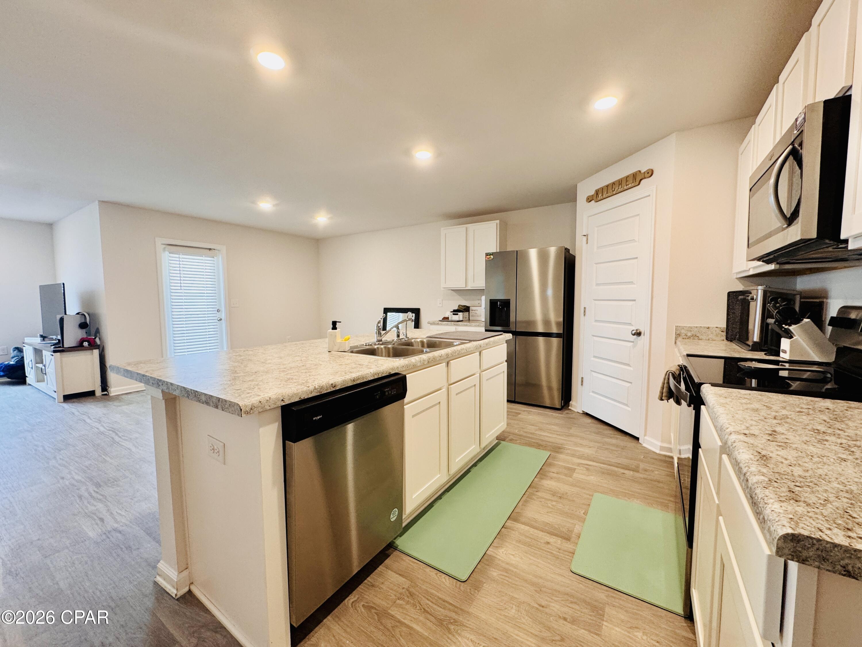 Available Now! Welcome to this beautiful 4-bedroom, 2-bathroom home in the desirable Cedar Grove community. Built in 2021, this well-maintained home offers 1,788 square feet of thoughtfully designed living space with an open-concept floor plan perfect for everyday living and entertaining.

The spacious kitchen features granite countertops, stainless steel appliances, a large pantry, and an oversized island overlooking the living and dining areas. The private primary suite offers a walk-in closet and an en-suite bath with dual vanities and a walk-in shower. Three additional bedrooms provide plenty of space for family, guests, or a home office.

Additional features include luxury vinyl plank flooring in the main living areas, a dedicated laundry room with washer and dryer hookups, a two-car garage, energy-efficient construction, and a covered back patio overlooking the backyard.

Conveniently located just minutes from Tyndall Air Force Base, schools, shopping, dining, and medical facilities, this home offers easy access to everything Panama City has to offer.

Tenant is responsible for all utilities and lawn maintenance. Pets may be considered with owner approval, a non-refundable pet fee, and monthly pet rent. Application, credit, income, background, and rental history verification required.

Schedule your showing today--this beautiful home is ready for immediate occupancy!