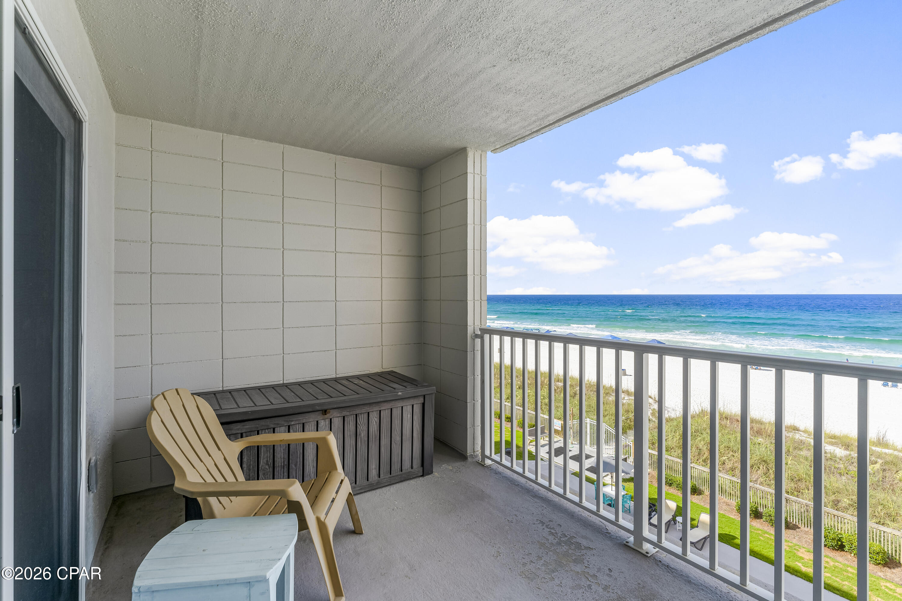 Welcome to your new gulf front retreat at Mariner West, where breathtaking views and resort-style amenities create the perfect coastal escape. This turnkey 1-bedroom, 2-bath condo is filled with natural light and showcases stunning panoramic views of the emerald-green Gulf waters and sugar-white sandy beaches.  Enjoy spectacular sunsets from the comfort of your private balcony, the ideal place to savor your morning coffee or unwind with an evening cocktail.  Inside, a soothing coastal-blue palette creates a serene and relaxing atmosphere throughout the property. This condo is being offered fully furnished and rental-ready, making it an excellent investment opportunity or personal beach getaway. The kitchen features granite countertops, a tasteful stone tile backsplash, and rich cherry cabinetry, while both bathrooms feature granite countertops. Located on the coveted east end of Panama City Beach, Mariner West is a desirable low-density mid-rise community offering an impressive array of amenities, including a Gulf-front swimming pool, grilling and patio area, lighted tennis courts, pickleball, shuffleboard, and a game room with lounge area, pool table, and TV. This is your opportunity to own a piece of paradise and enjoy the best of beachfront living - call today!