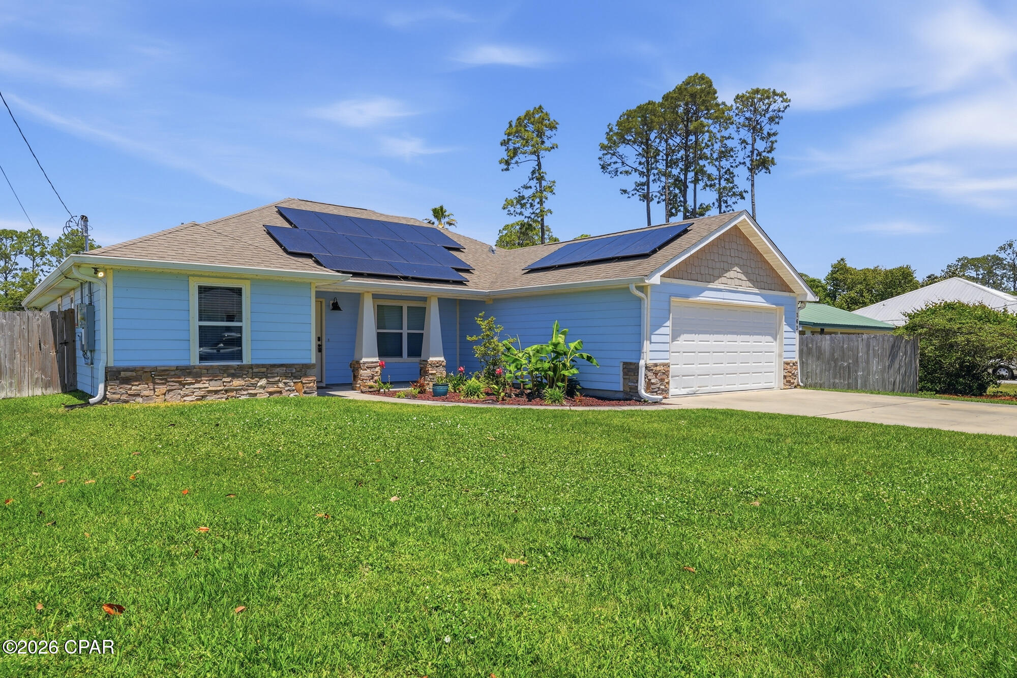 72hr kick-out clause in place. New HVAC, no HOA, and a location just minutes from the Gulf beaches make this home stand out from the moment you arrive. Situated in a quiet, established neighborhood filled with long-term residents, this property offers the kind of privacy, stability, and convenience that's becoming increasingly difficult to find in the Panama City Beach area.

Inside, the home features soaring ceilings, abundant natural light, and an open, airy layout designed for both everyday comfort and entertaining. The spacious living areas flow seamlessly into the kitchen and outdoor spaces, creating a home that feels both functional and inviting.

The home also includes a solar panel system that will be fully paid off by the seller at closing, allowing the new owner to enjoy the long-term energy savings and efficiency benefits without taking on the remaining balance. A transferable warranty adds even more value and peace of mind. In addition, the HVAC system was replaced in September 2025, as well as an incoming new water heater expected to be installed by May 15, 2026, providing reliable comfort for years to come.

The outdoor living space is equally impressive. A fully fenced backyard with a dedicated dog run makes it ideal for pets and families, while the screened-in porch and oversized covered deck create the perfect setting for relaxing evenings, weekend cookouts, or entertaining guests year-round. The built-in irrigation system helps keep the landscaping looking its best with minimal effort.

Location is another major highlight. The home is within walking distance of Scott Field Park and only a short golf cart ride to Frank Brown Park and Pier Park, giving you quick access to restaurants, shopping, entertainment, and community events. And of course, the white-sand beaches and emerald waters of the Gulf are just minutes away, making beach days easy and convenient.

Additional upgrades, including the epoxy-coated garage floor and updated kitchen backsplash, add a clean, polished finish to this well-maintained, move-in-ready home.

Combining smart upgrades, energy efficiency, outdoor living, and an unbeatable coastal location, this property offers a lifestyle perfectly suited for both full-time living and weekend escapes.