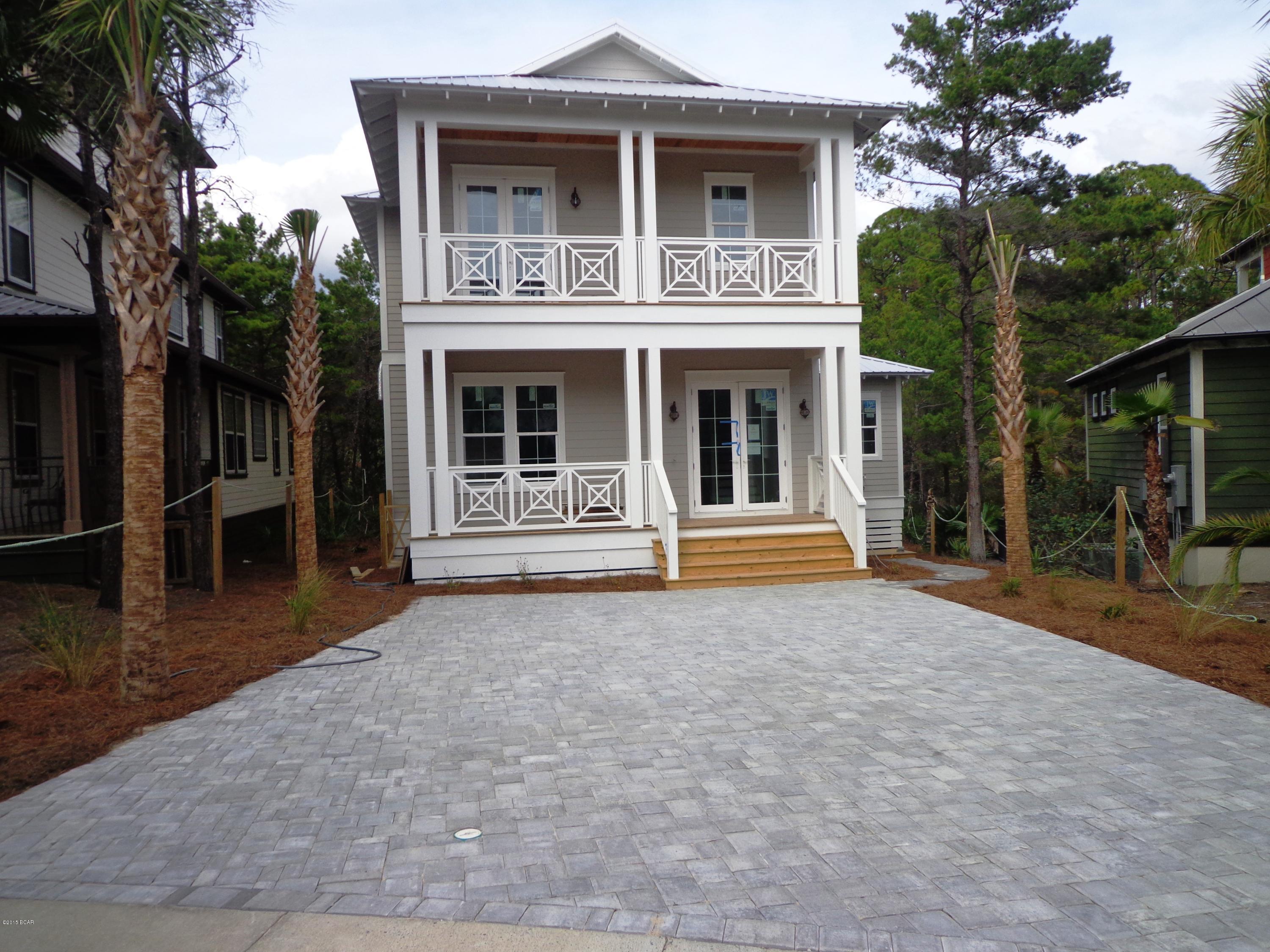 Easy to show over the Holidays!!Price Reduced!!! 5br/4.5ba will be a rental machine! Home will be completed in 2 weeks.  This home is approx. 2806 sq ft heated and cooled and will feature, approx 700 sq ft of covered porches, front and back, hardwood floors, granite counter tops in kitchen and bathrooms, custom cabinets, 5 bedrooms and 4.5 baths. Window and door alarms. Upgraded CAT5 wiring, window and door alarms. This home has two master suites. House is on one the largest lots and backs up to natural common area for privacy. The house Will make a great second home or rental.  age, sq ft and lot dimensions are approx.There is a $500 New Buyer HOA Capital Contribution Fee and a $100 New buyer transfer fee Buyer HOA Transfer Fee.