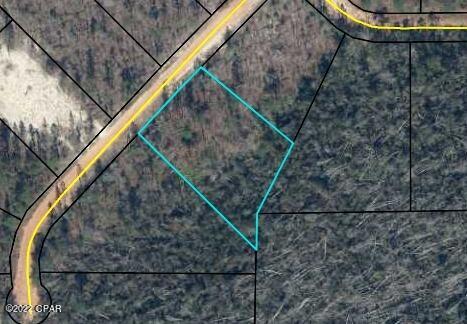 A large wooded lot at Compass Lake on the Hills. Did you know that owning property in Compass Lake provides you access to several amenities like a pool, driving range, kayaking, private boat ramp, paddle boarding, fishing, swimming, horseback riding and much more? There are several lakes/ponds in this community with great fishing and swimming. With just a little bit of land clearing, this property can be a dream homestead site. 

This owner has 17 other properties for sale in Compass Lakes. Make an offer on the other properties and get them as a package deal!