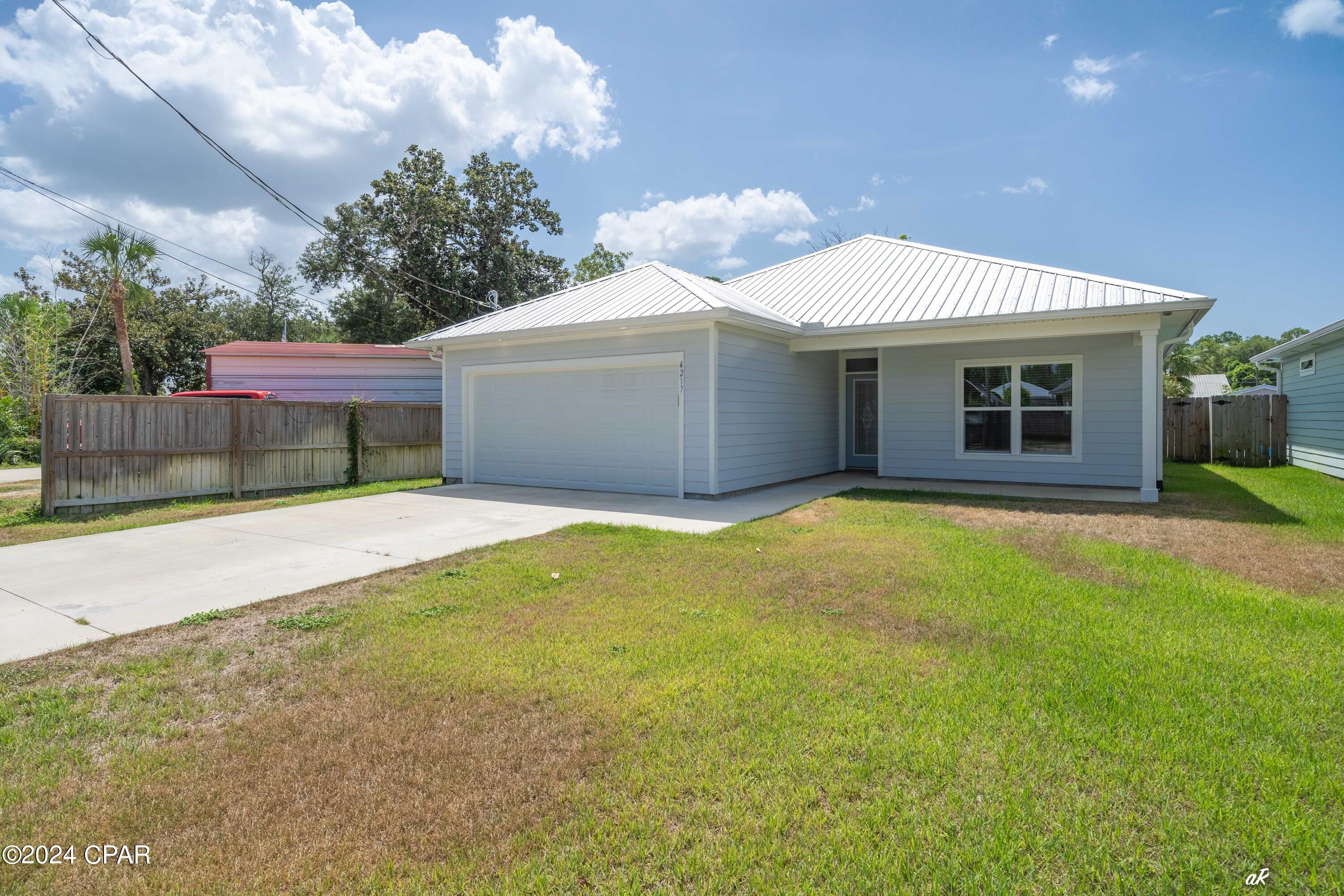 This house is located right next to the Navy Base. This custom built home is centrally located just off of Thomas Dr. and Bay Point. This new 3 bedroom 2 1/2 bath house boast Stainless steel appliances, white shaker cabinets , granite counter tops , and tile throughout the house. This rental is pet friendly with a nice fenced in back yard for your fury friends. Application is required before a showing. Credit and background check are required