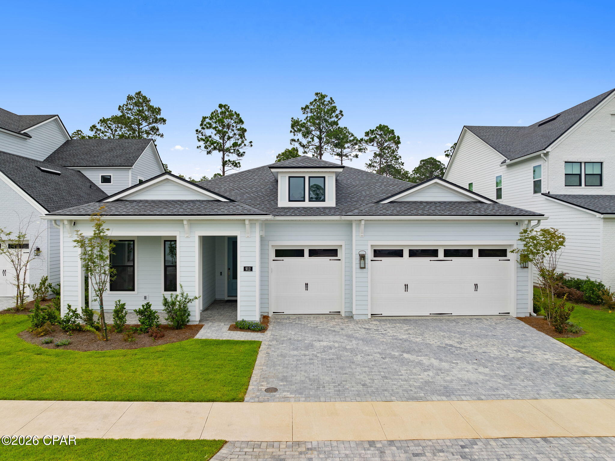 Welcome to Breakwater, one of Panama City Beach's premier gated communities, where resort-style amenities and everyday convenience come together.

This beautifully maintained 4-bedroom, 3.5-bath home offers a thoughtful floor plan, a spacious 3-car garage, and a backyard with plenty of room to create your own private oasis, including space for a future pool.

Situated on a desirable corner homesite within a quiet cul-de-sac, this move-in-ready home allows you to enjoy the benefits of newer construction without the wait.

Thoughtfully designed with soaring ceilings and an open-concept layout, the home feels bright, airy, and inviting from the moment you walk in. The spacious kitchen and living area create the perfect place for gathering, entertaining, and enjoying everyday life.

The primary suite offers a spa-inspired bath complete with an oversized soaking tub, creating the perfect place to unwind at the end of the day.

What truly sets this property apart is the lifestyle that comes with it. Breakwater residents enjoy access to a resort-style community pool, pickleball and tennis courts, playground, fitness center, clubhouse, and gated entrance--all designed to make everyday living feel a little more like a getaway.

Conveniently located just minutes from shopping, dining, Northwest Florida Beaches International Airport, and the beautiful white-sand beaches of the Emerald Coast, it's easy to see what makes this home so special.

Where everyday living feels like a getaway.