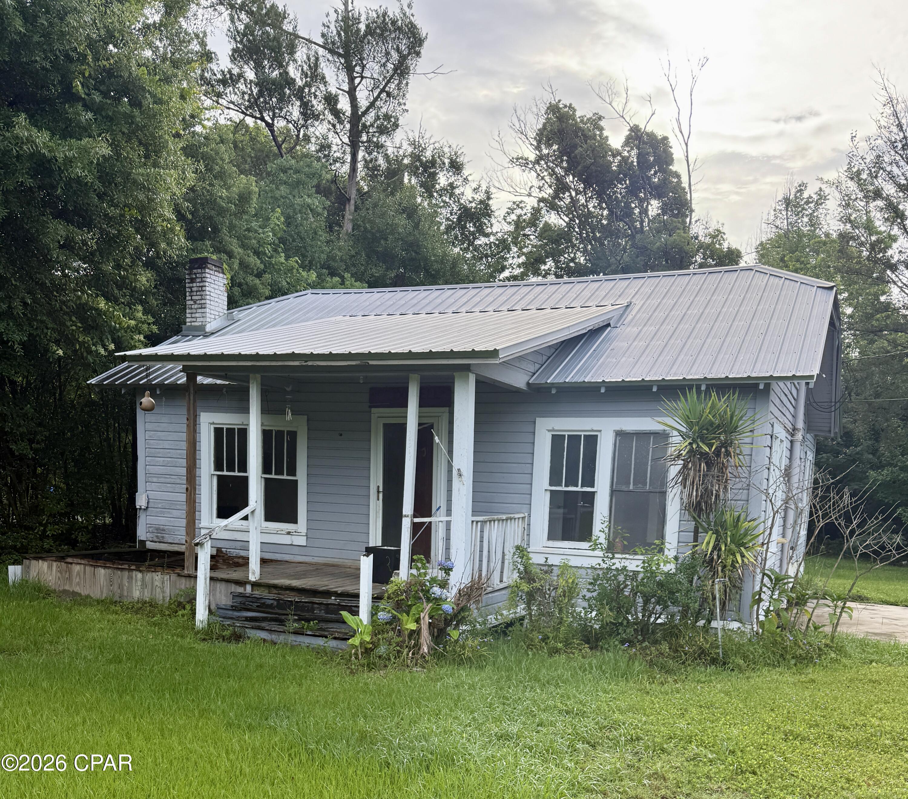 Looking for your next investment opportunity or fixer-upper project? This 3 bedroom, 1 bath home located in the heart of Blountstown, Florida offers endless potential for the right buyer.

The home features approximately +/- 1,068 square feet of living space and sits on a 0.34 acre lot. The property does need repairs, making it a great option for investors, flippers, or handy homeowners looking to build equity. One major upgrade already completed is the newer metal roof, giving you a solid start on renovations.

Conveniently located within a two mile radius of schools, grocery stores, restaurants, and shopping, this property offers small-town convenience with an excellent location. Plus, you're only about an hour from the beautiful Florida beaches and approximately an hour from Tallahassee.

With the location, lot size, and potential this property has to offer, this could be your next great project. Schedule your showing today!