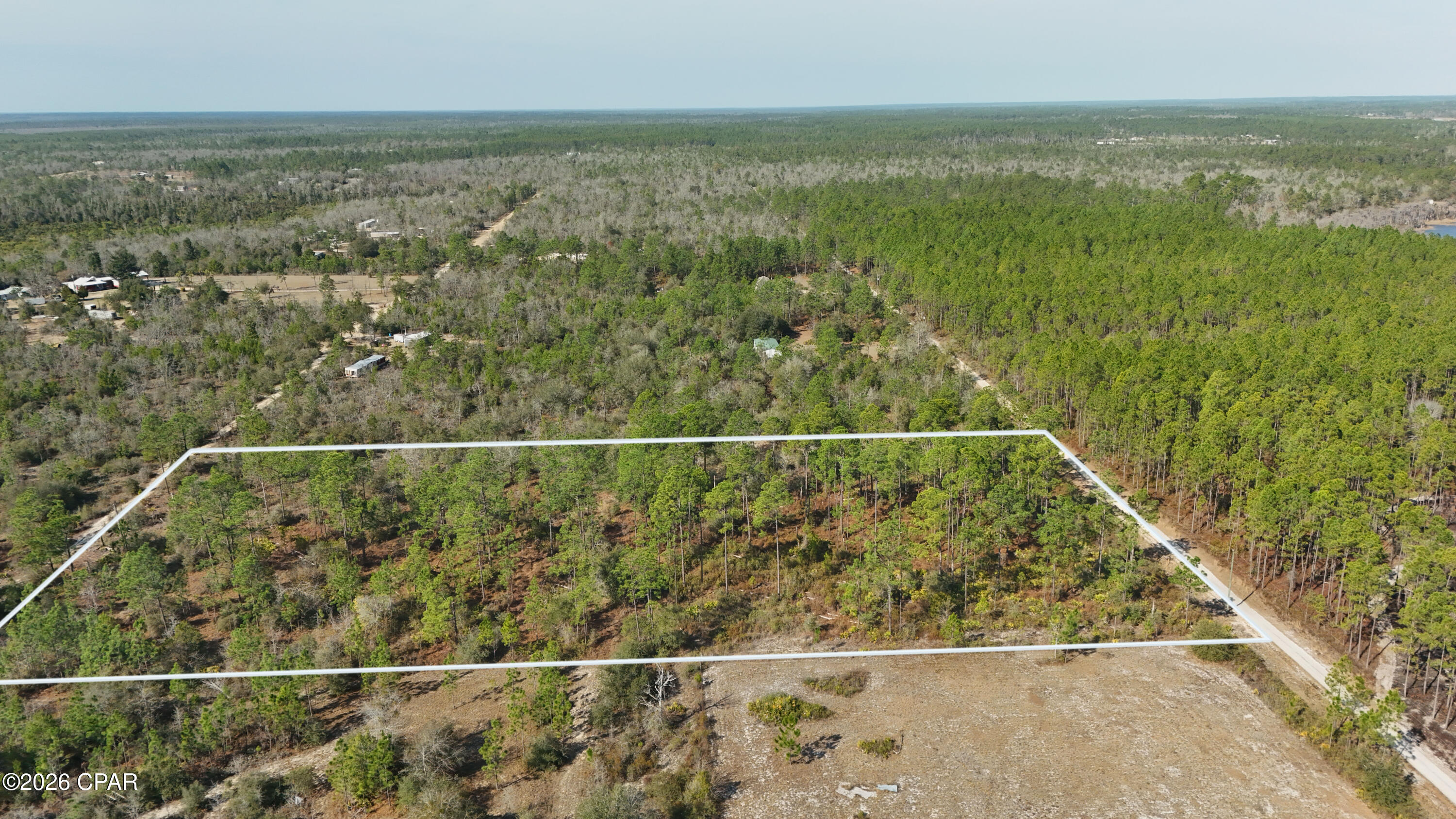 An exceptional 5-acre estate opportunity, offering flexibility for a private retreat, custom build, or strategic investment. No HOA or restrictions, this property provides both freedom and long-term security. Beautiful surroundings, flat and dry!! Future growth, excitement, and potential value appreciation to the area. A rare chance to secure acreage in a path of progress. Whether you're planning to build your dream home or invest in a high-quality rural parcel, this property provides value, versatility, and a prime location.