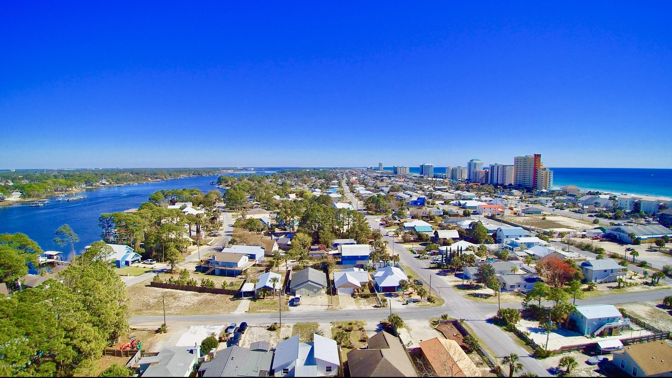 **See Video Under Pictures**Two Lots Total Available For Sale Together or Separately- $75,000 each.  This listing is for 3915 Ural St., which is Lot 13, a vacant lot and located to the left of Lot 14.  Both lots are 50x120, have been cleared, not in a flood zone, no HOA, and are ready to be built on.  3915 Ural had a home on it that was removed on 02/2018 and was on septic, electric, and water, and the slab was left in place also.  Both lots are walking distance to the lagoon, where you are close to both the Quail and Dolphin Bay Boat launch and Gulf-of-Mexico.  Look at the aerial shots and video to see how close you are to both.  Build your beautiful dream home and feel like you are on vacation all day long.  Within minutes to St. Andrew State Park, Rick Seltzer’s**enter on more tab State Park, world world famous restaurants and clubs, area attractions, and shopping.   Call today before these lots are gone and your dream of living in the World-Famous Panama City Beach becomes someone else's reality!