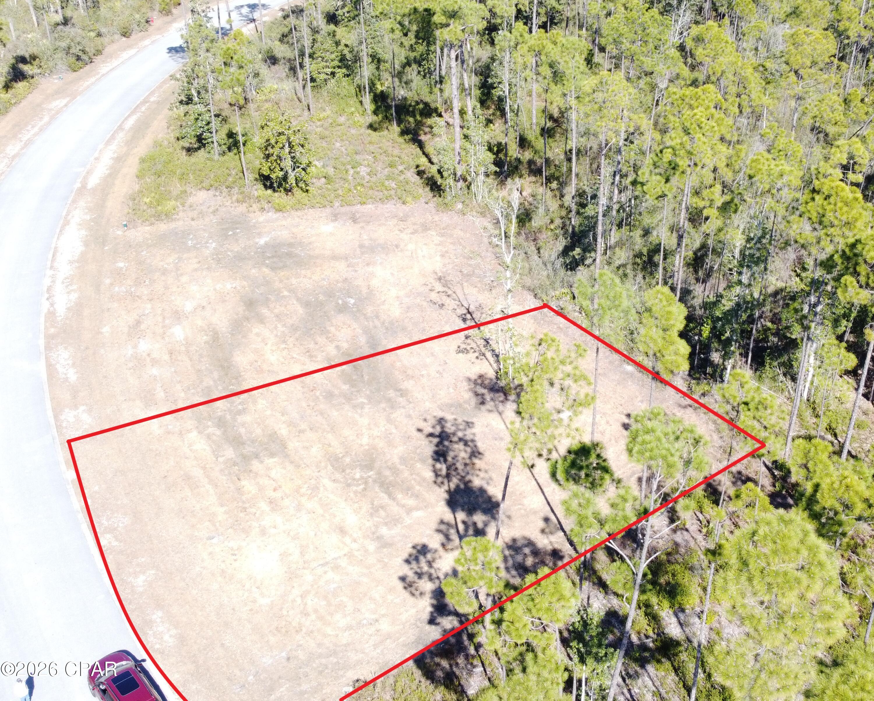 A Beautiful home site in the desirable Laird Point. Situated on the west side of the peninsula, so you will enjoy the wonderful breezes off of East Bay. Lot is already cleared and de-rooted, saving the new owner time and money. Water, sewer, and electric are ready to connect. The lot next to this one is also available (919 Watermark Way. Perfect for someone who wants to build a large home on two lots, have family build next door, or just hold it for the future. Great proximity to the tennis courts and new pickleball courts. Laird Point is a gated, waterfront community. It features underground city utilities and ribbon curbed streets. Amenities also include RV/Boat storage. Beautiful custom homes throughout. Schedule your visit today!
