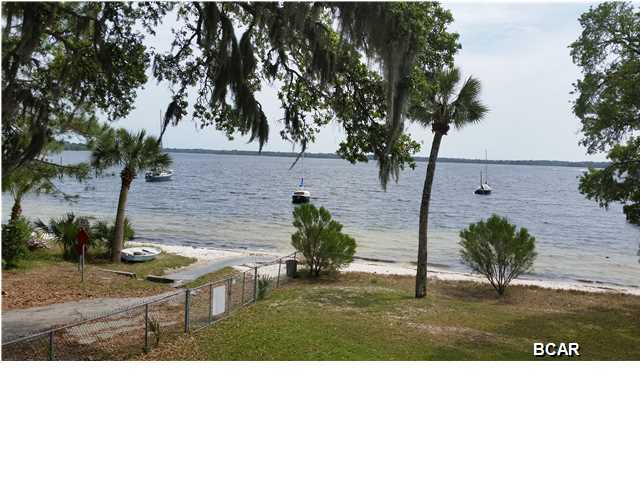 Ground floor beautifully remodeled unit in the Bay front building with entry just off the east side near the boat launch. Front entry is just adjacent to the elevator for upstairs balcony enjoyment. Kitchen has new stainless steel appliances and granite counter tops. New carpet in bedrooms and new vinyl in both bathrooms and kitchen. Very nice and move in ready!