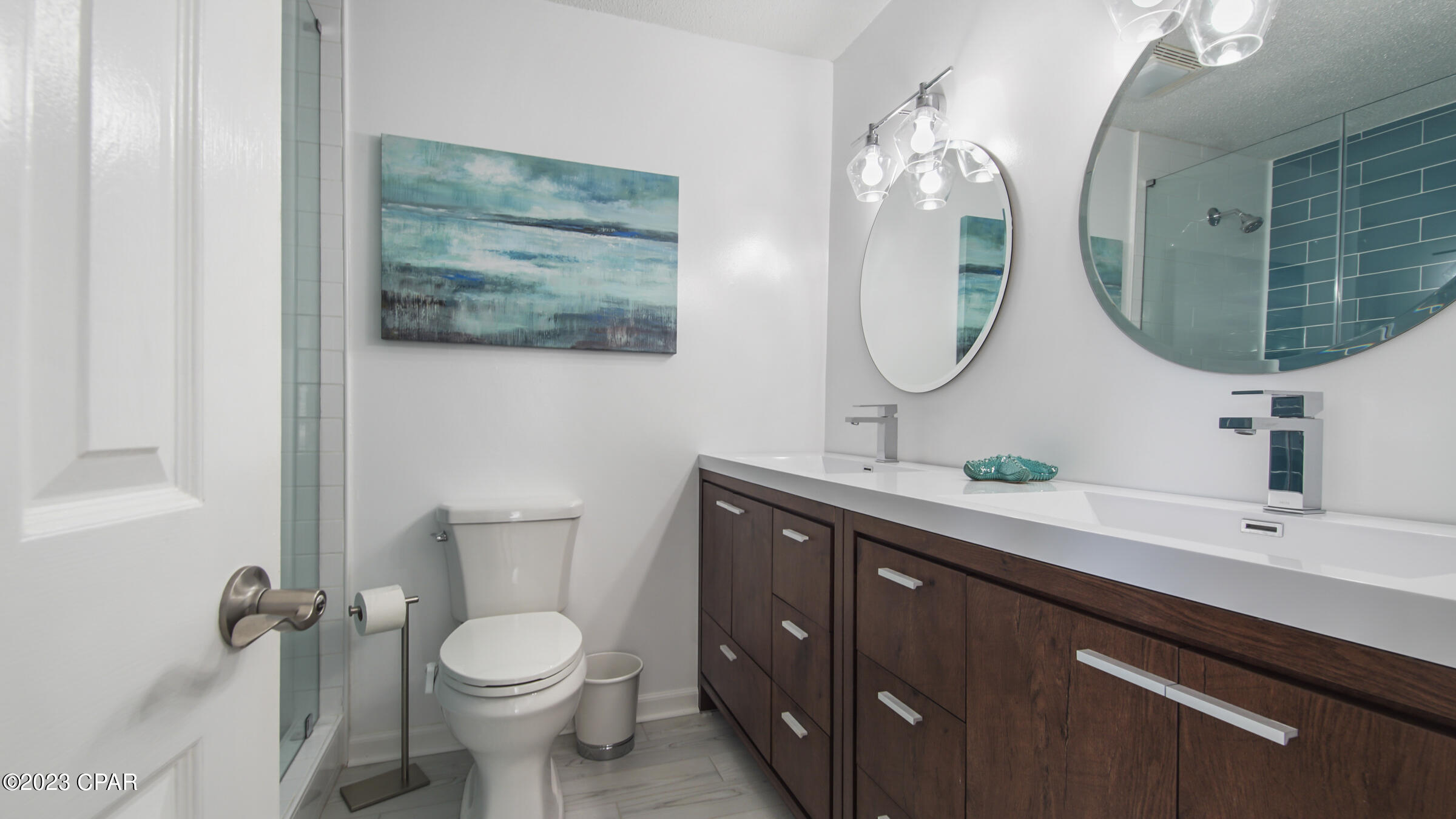 CURRENTLY UNDER CONTRACT, SELLER WILL CONSIDER BACKUP OFFERS Updated Townhouse for sale in Panama City Beach, FL!  Looking for a Beach Vacation Home or investment rental, but do not want to pay those high HOA Fees??  If so, you have found the perfect unit!!  Low Recreational fees provide access to all amenities at a low monthly fee.  This townhouse feels like a home, with a screened back patio and a fenced backyard, that overlooks open space to give you privacy.   Everything has been renovated and updated!!  New Roof, New H&A system, new flooring, Fresh paint, new kitchen and more! Two Huge Balconies off of each upstairs Bedroom.  Covered Parking space.  Flooring is tile and LVP. Perfect for home or rental especially if you have pets to enjoy the fenced yard! A MUST to see!