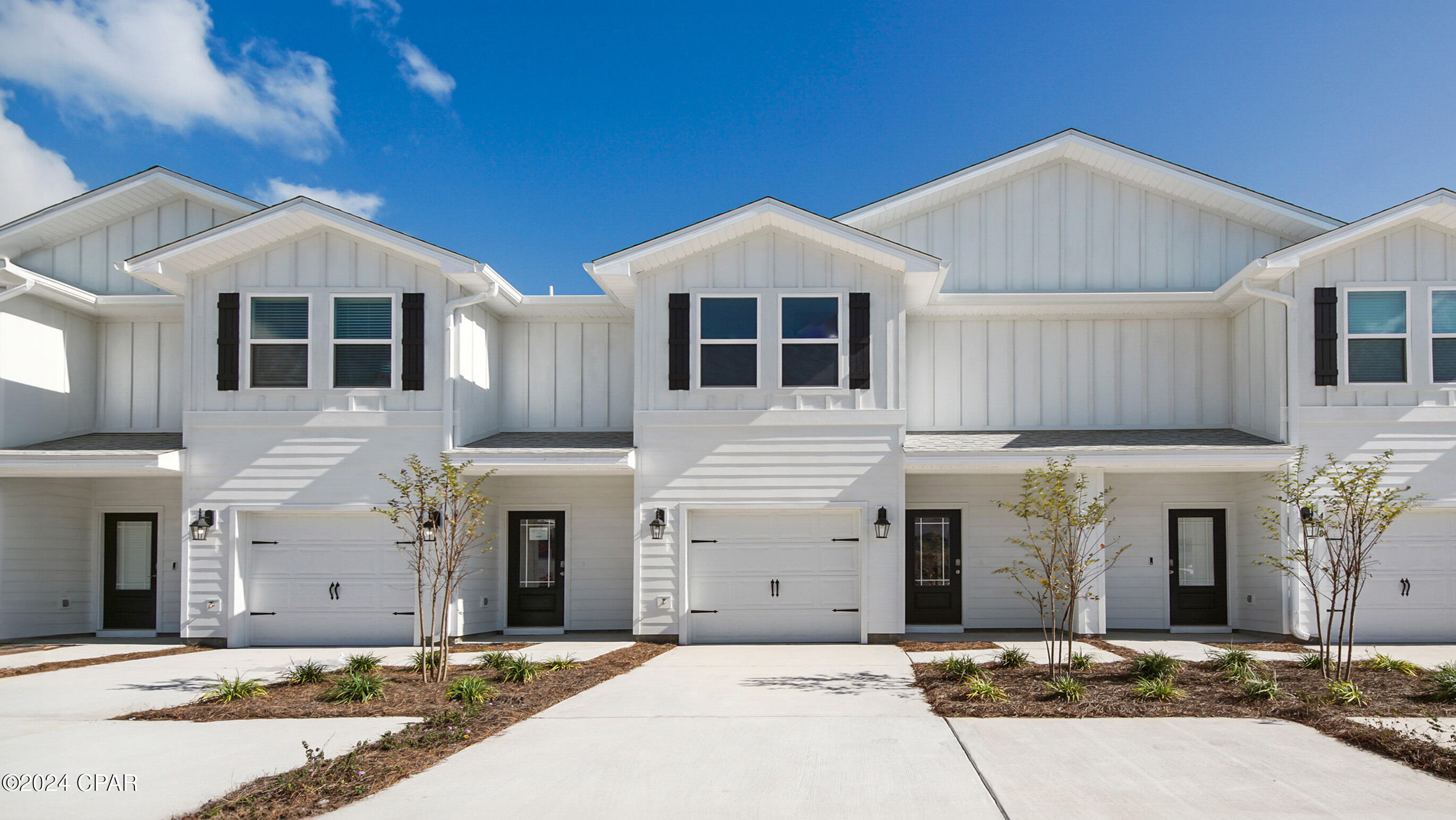 Welcome to 188 Ellery Lane at Bayside at Ward Creek in Panama City Beach Florida. This townhome is under construction and offers a welcoming space that has 3 bedrooms, 2.5 bathrooms, and a convenient single car garage. The bright entry leading to an open kitchen, living, and dining area that is designed for comfort and everyday living. The kitchen serves as the culinary center with a spacious center island, beautiful white cabinetry, quartz countertops, and a premium stainless steel appliance package including a smooth top stove, microwave and dishwasher.

The first floor is the heart of the home, while the privacy of the second level has all bedrooms, ensuring a quiet retreat. The main suite features a generous closet, an oversized shower, dual sink vanity, and a linen storage area in the private bath. Two additional bedrooms share a hall bath with shower tub combo that create a comfortable space for family or guests.

The interior features include EVP flooring throughout the main level and second level bathrooms and plush carpet on the stairs, upstairs hallway and bedrooms, Smart Home Technology Package comes standard, featuring a Qolsys IQ touch panel for thermostat and lighting control, ensuring security and convenience. Exterior features of Bayside at Ward Creek townhomes are equally impressive, with Hardie® siding and thoughtful lighting at the garage, front entry, and back patio. A landscaped front entry adds curb appeal and welcomes you to your very own slice of Florida paradise awaits. Call today for a tour of this floor plan.