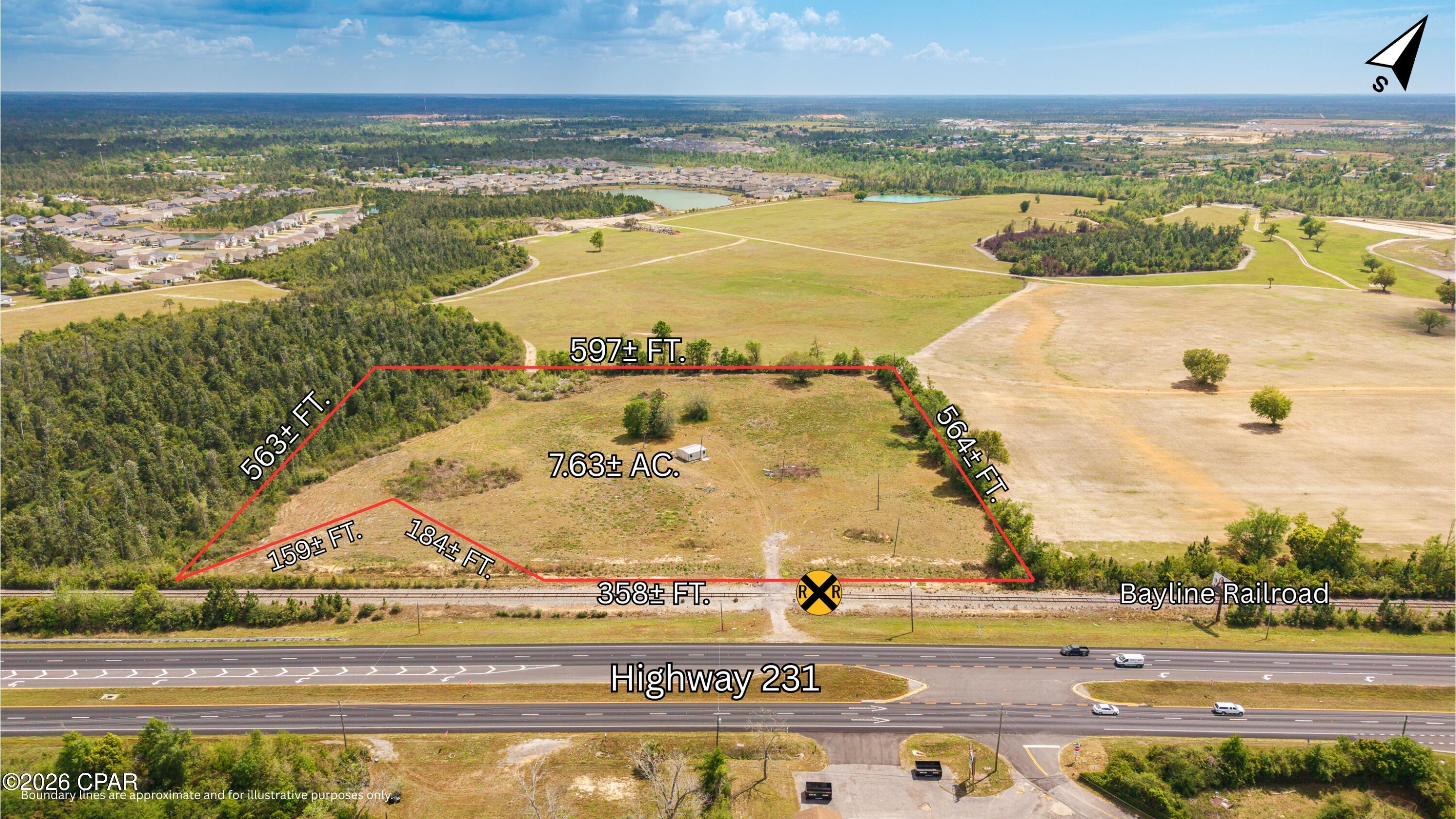 Prime Commercially zoned site with direct access to Highway 231 via rail crossing on the Bay Line Railroad.  Site is zoned General Commercial (C-3A) in Bay County which allows for may uses, with all public utilities available on Hwy 231, in addition to a 4 inch well near the center of the property.   The site has full access from the north and southbound lanes via a median cut at the site's southernmost highway frontage. The 20± Ft. by 24± Ft. portable shed conveys with the property.  This site is prime for future development with rail access, favorable zoning, great visibility and easy access.