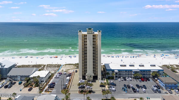 Grande Surf Club Unit 11W - Gulf-Front Condo With Amazing Views
This condo is perfect for anyone who wants easy, peaceful beach living with stunning views. Whether you're looking for a full-time home, a second home, or a high-end investment, this place offers comfort, space, and a true beachfront feel.
Step inside this 3-bedroom, 2-bathroom condo with 1,783 square feet of living space. It comes fully furnished and has new LVP flooring in place of all carpeted areas. The layout is open and bright, making it great for relaxing or hosting friends and family.
One of the best features is the 400-square-foot wraparound balcony. From here, you get unobstructed views of the Gulf, perfect for watching sunsets or enjoying fresh ocean air.
The Grande Surf Club is a private, low-density building with only two units per floor, so it stays quiet and uncrowded. You also get private beach access and a resort-style community pool. Plus, you're close to some of the best dining and attractions in Panama City Beach.

Unit 11W gives you beachfront living, wide Gulf views, a peaceful building, and quick access to everything you love about Panama City Beach. It's a great fit for anyone wanting an easy, relaxing, and upscale coastal lifestyle. Schedule your private showing today.