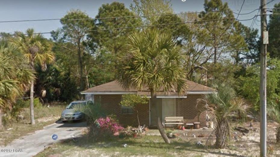 Great Location!  Just a few blocks to the beach, and one block to the Lagoon.  This home has new laminate hard wood floors through, new paint, new blinds, and new light fixtures.  This home is a 3 bedroom 2 bath, with large drive way, storage shed(s) and nice size laundry room.