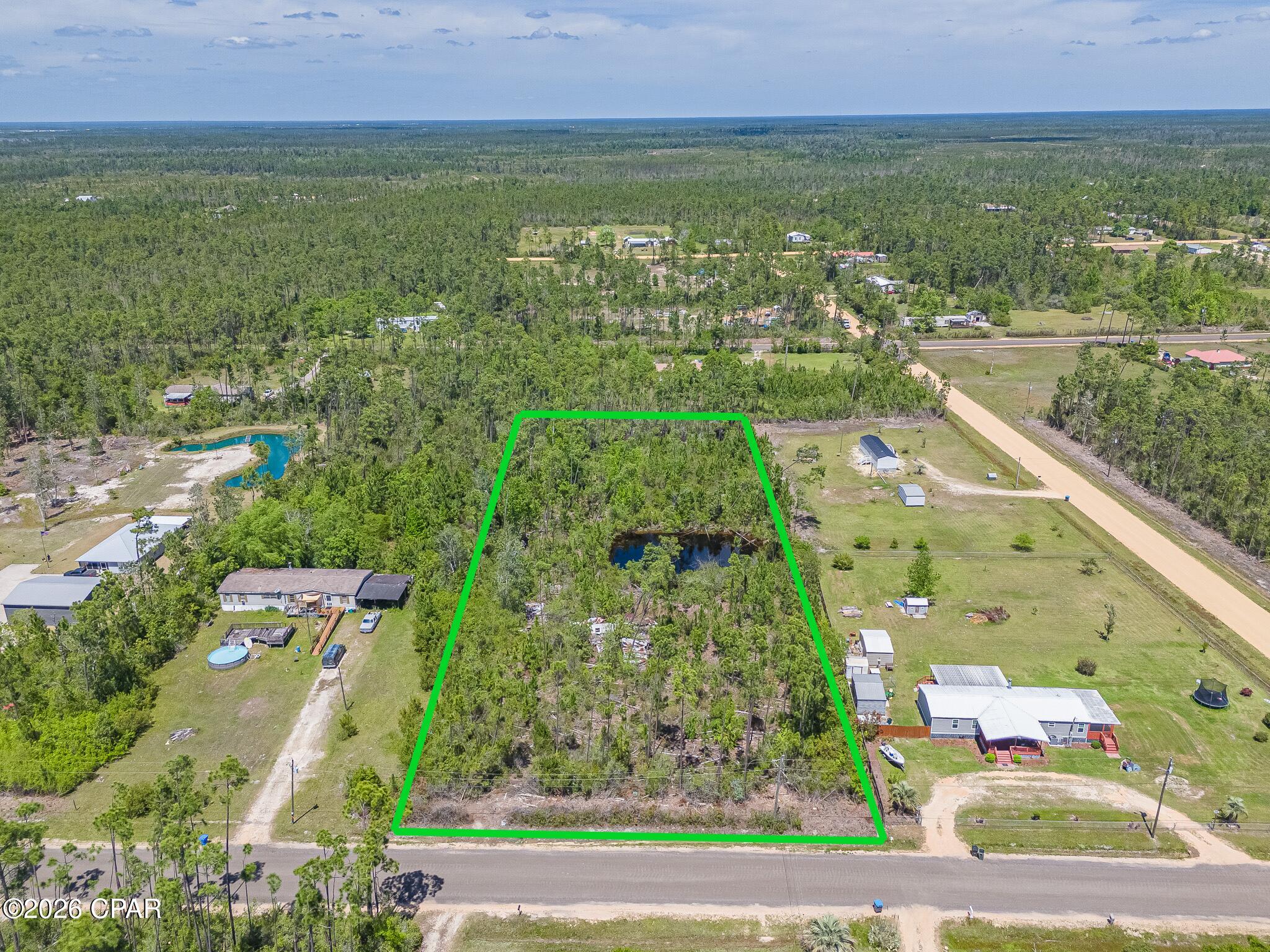 Build Your Vision in East Callaway, FL - 1.97 Acres with a pond.
Discover the perfect opportunity to create your dream home or investment property on this spacious 1.97-acre vacant lot nestled in the growing community of East Callaway, a suburb of Panama City.
This expansive property offers the ideal blend of privacy, convenience, and potential, giving you the space to build exactly what you envision--whether it's a custom home, retreat, or future development.
Prime Location Highlights:
Just a short drive (under 15 minutes) to Tyndall Air Force Base
Only minutes from the white-sand beaches of the Gulf Coast
Convenient access to shopping, dining, and everyday essentials
Surrounded by beautiful parks, nature trails, and recreational activities
Property Features:
Nearly 2 acres (1.97 acres) of usable land with a pond
Plenty of space for a home, workshop, outdoor living, and more
Peaceful setting with room to grow
Located in an area experiencing continued growth and development
Whether you're looking to build now or invest for the future, this property offers endless possibilities.
Don't miss your chance to own a piece of Florida land within minutes near the coast!