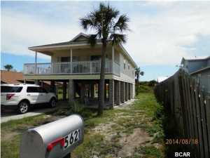 This is the perfect for that beach getaway, just a couple blocks to the Lagoon and walking distance TO THE Gulf. Also a perfect starter home, sound construction with Hardi board exterior for easy maintenance, lots of potential, under roof you have 2204 sq'. This is a stilt home with 2 bedrooms,1 bath, Living room/Dining combination and kitchen with laundry room located on the second floor. Both bedrooms are nice size. Huge covered porch/deck that extends the width of the home.