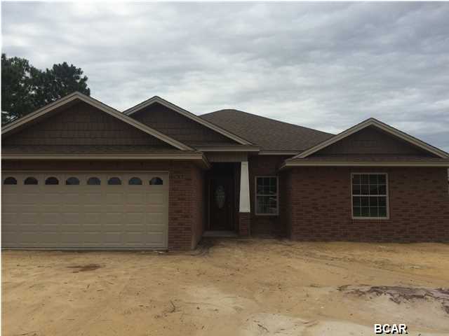 New construction brick home in Cedar's Crossing offering easy access to TAFB and Panama City's major shopping and dining corridor. Interior of home offers kitchen with custom stained Maple cabinets and Living Stone Countertops, large volume living room with wood laminate flooring, master suite with box ceiling, double vanity, separate shower and tub, two walk-in closets, dining room with box ceiling, 4th bedroom/office, oil rubbed bronze fixtures. Exterior features fully sodded yard with timed sprinkler system, two car garage with opener, 8x11 covered back porch, underground utilities and sidewalk. Click photo for additional pics, home's website and virtual tour. All ages, sizes, and school zones are approximate and are subject to change.