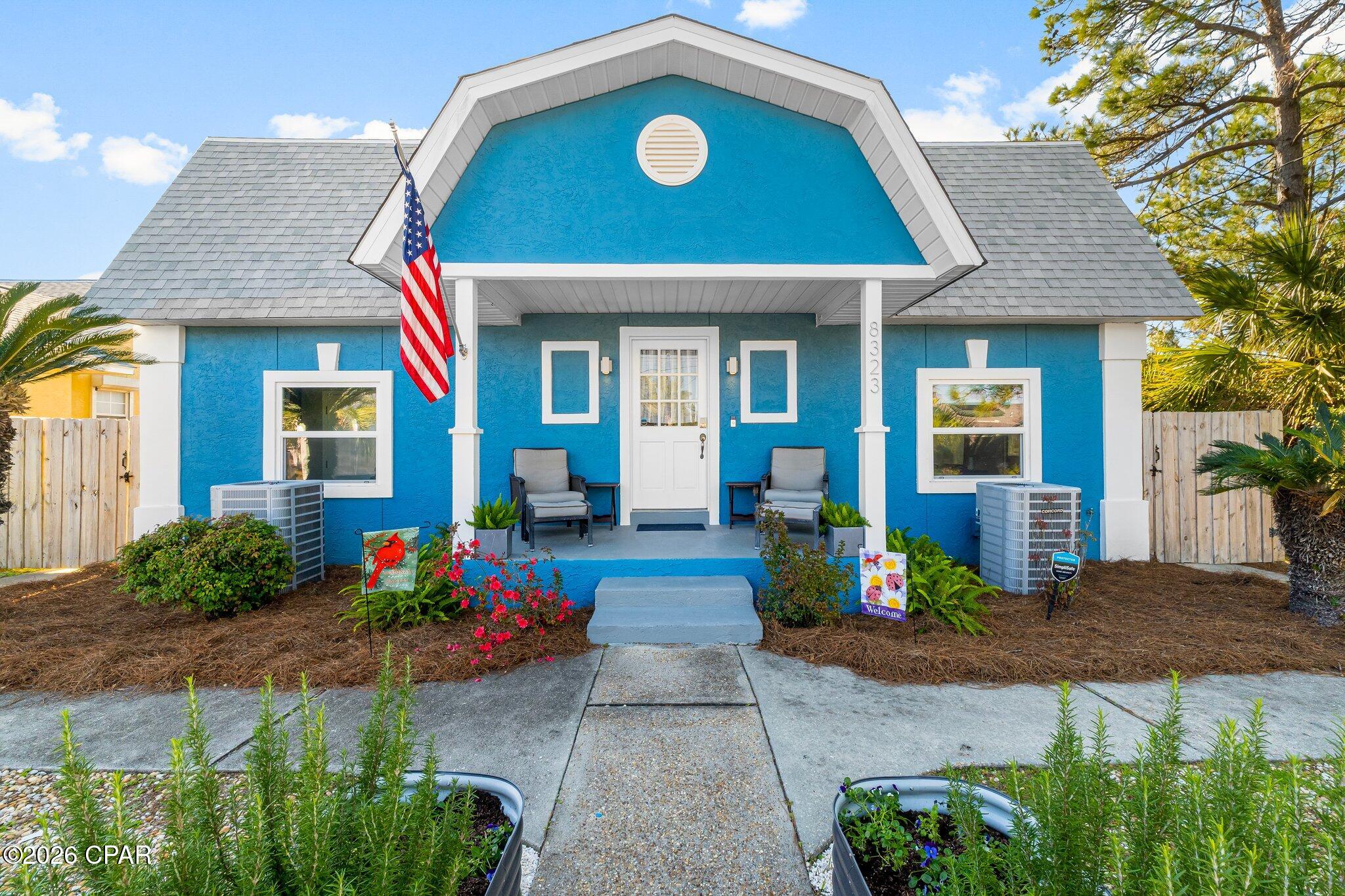 Beautifully renovated coastal retreat just blocks from the Gulf, ideal as a primary residence, second home, retirement getaway, or vacation property in Panama City Beach. Hop on your golf cart and head to the beach, local restaurants, marinas, and nearby public boat ramps while enjoying the relaxed coastal lifestyle Lower Grand Lagoon is known for.

This charming 3-bedroom, 2-bath home features an open-concept floor plan with modern finishes and thoughtfully upgraded features throughout. The spacious kitchen is designed for entertaining and includes stainless steel appliances, a double oven, farmhouse sink, and an oversized center island that flows seamlessly into the living and dining areas.

Upstairs, two oversized bedrooms open onto a large sun-filled deck, creating the perfect space to relax after a day at the beach.

Step outside into your own private backyard oasis featuring mature natural landscaping, a fully fenced yard, three gazebos for shaded outdoor living, and a tranquil waterfall feature that adds to the peaceful atmosphere.

Move-in ready and full of coastal charm, this property offers the perfect blend of comfort, lifestyle, and location with no HOA.