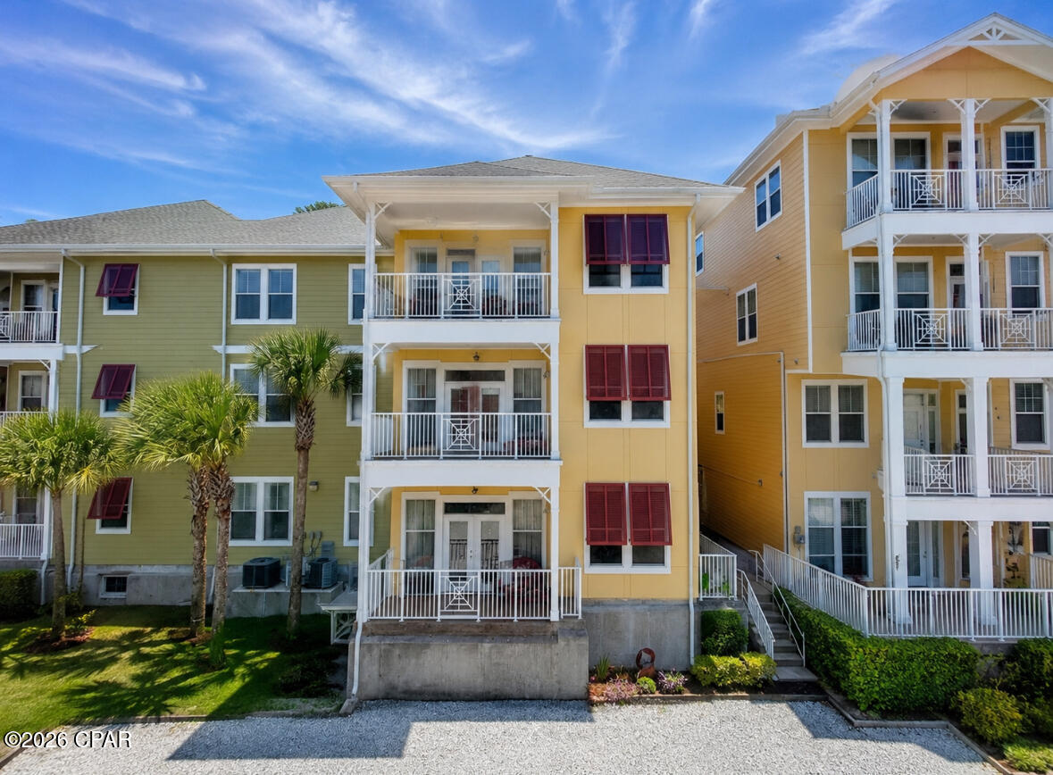 Welcome home to Island Reserve...this gated community is centrally located in the heart of Panama City Beach just a short drive to the Navy Base, beautiful gulf beaches, shopping, golf and fabulous waterfront dining as well as St. Andrews State Park!  This is the ALL ONE-LEVEL 1 bedroom plus bonus room  floorplan offering granite, stainless appliances plus washer/dryer stay! Seller added custom built-ins.  Island Reserve offers exquisite sparkling pool with waterfall, media center, indoor basketball, gym, clubhouse and hot tub!