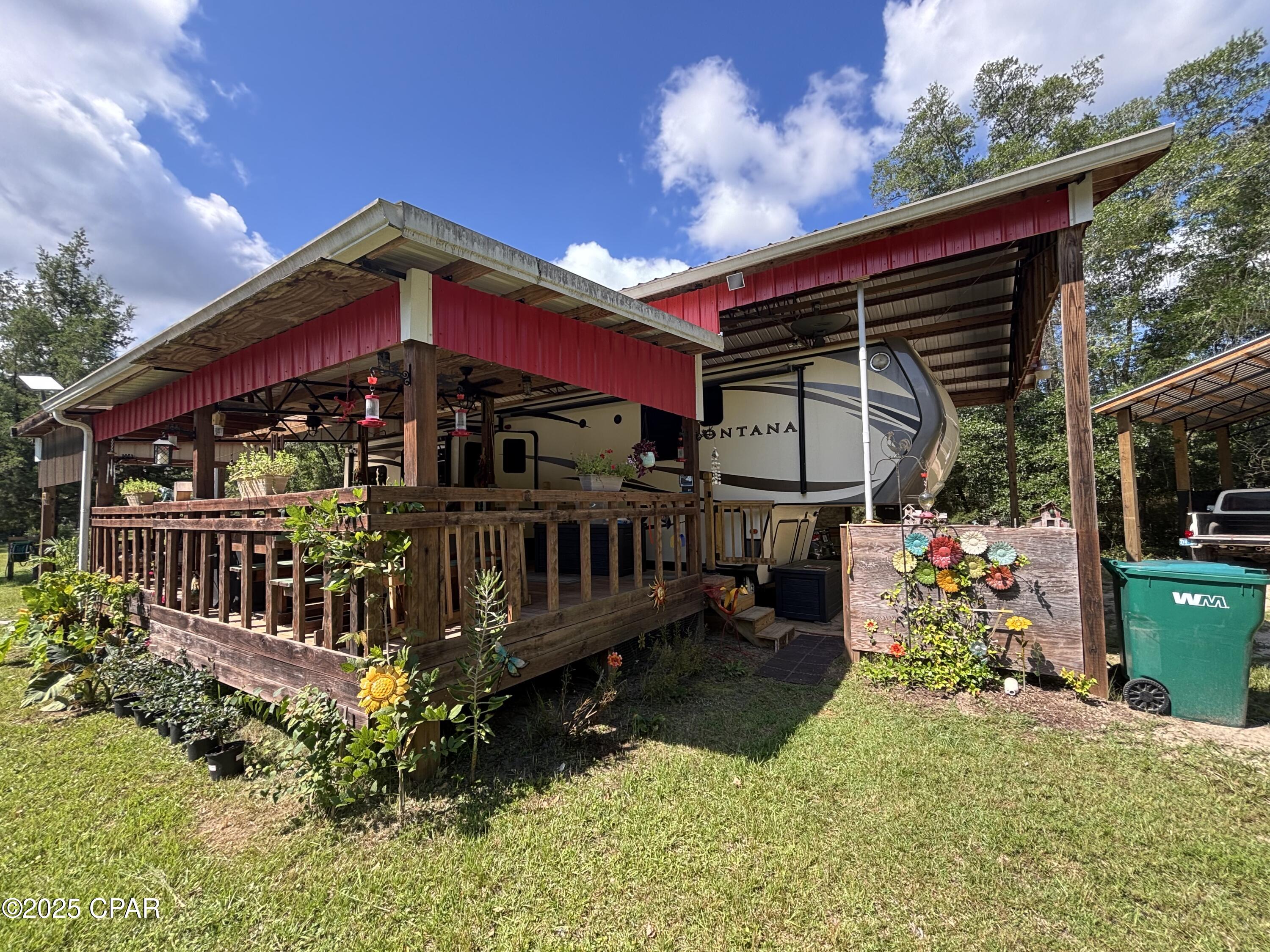 12.5 Acres of Versatile Rural Paradise
Discover your dream retreat on this expansive 12.5-acre property in the heart of Caryville, FL! Perfect for those seeking a blend of rural serenity and modern functionality, this land offers endless possibilities for outdoor enthusiasts, hobbyists, or anyone looking to build their forever home.
Property Highlights:
•  Spacious 12.5 Acres: Plenty of room for recreation, farming, or future development, with a mix of open and wooded areas.
•  30x60 Pole Barn with RV Amenities: Custom-built for RV living, featuring a sturdy deck and dedicated cooking area, ideal for entertaining or a comfortable outdoor lifestyle.
•  24x24 Pole Barn with Car Lift: A mechanic's dream! Includes a car lift, built on an 8 inch thick concrete slab with robust 8x8 poles for durability.
•  Existing Infrastructure: Fully equipped with a septic system, well, and propane, saving you time and expense for immediate use or future builds.
•  Prime Location: Nestled in peaceful Caryville, offering privacy yet convenient access to local amenities and major routes.
Whether you're envisioning a weekend getaway, a full-time residence, or a workshop haven, this property is ready to bring your vision to life. Don't miss out on this rare opportunity to own a well-equipped, versatile piece of Florida countryside!