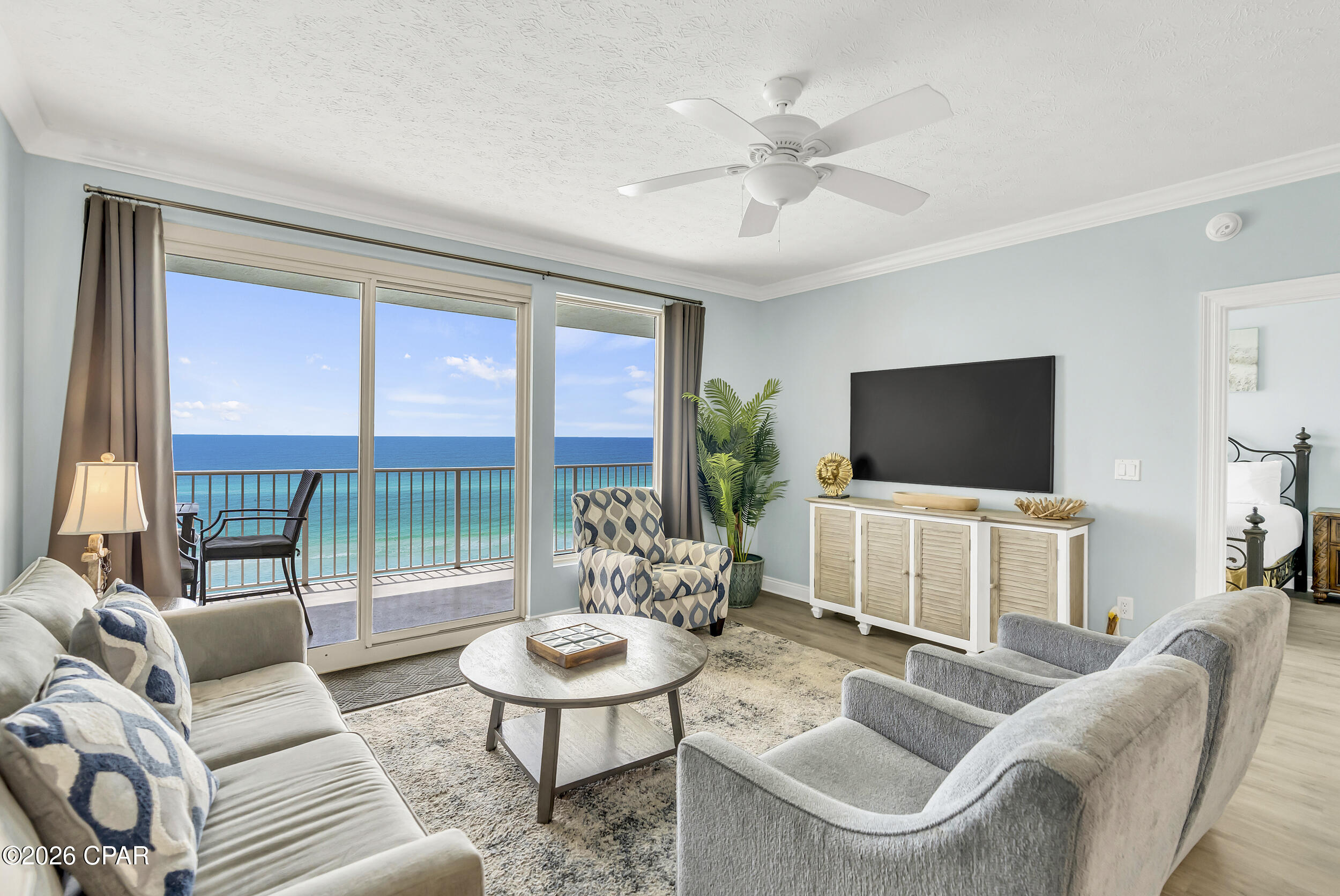 CURRENTLY UNDER CONTRACT, SELLER WILL CONSIDER BACKUP OFFERS. Direct gulf-front living in Panama City Beach's Treasure Island with wide, unobstructed water views, an oversized 270 sq ft balcony, and a layout designed for effortless coastal living and strong short-term rental appeal.

Inside, bright, airy interiors are enhanced by durable luxury plank flooring throughout, creating a cohesive, low-maintenance finish. The open-concept layout connects kitchen, dining, and living areas, all oriented toward the beach for uninterrupted natural light and views.

The kitchen is designed for function and ease, featuring a large granite breakfast bar and stainless appliances including a new dishwasher (2022) and refrigerator (2025). A dedicated laundry room adds convenience with a new washer and dryer (2025).

The gulf-front primary suite offers a relaxed retreat with a new king bed (2024), ensuite bath with dual vanities, walk-in shower, and generous closet space, plus direct balcony access. The second bedroom is also ensuite for privacy, while built-in bunks add flexible sleeping capacity for guests.

Treasure Island delivers resort-style amenities including a beachfront pool deck with a 120-ft heated pool, separate kiddie pool, shaded loungers and gazebos, direct beach access, gulf-view fitness center, game room, secure covered parking garage, seasonal beach service and on-site security. 

Located on the quieter east end of Thomas Drive near St. Andrews State Park, this stretch of Panama City Beach offers a more relaxed coastal setting while still being close to marinas, golf courses, waterfront dining, live entertainment, and local favorites like Schooners and Captain Anderson's.

With some of the lowest HOA fees on the beach, this property delivers ease of ownership, strong guest appeal, and a premier gulf-front location in one of Panama City Beach's most consistently desirable communities. Schedule your private showing today!