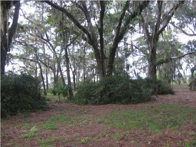 Unique--Waterfront-Cottage 3BR.2Bath (1690SF) sitting on a large N.Bay waterfront lot. House is concrete block built in 1939. Must see to appreciate this one. No dock. Oaks, Magnolias and Azaleas on a peaceful park-like lot. Vinyl floors in kit and baths with new hardwood floors in living room, formal dining room and 3 bedrooms. Fresh paint throughout. Quiet screen porch on right side of house and small entry screen porch on left side. Detached ''garage'' can be used for storage and has washer/dryer connections.

Directions: From Hwy 390 (between Hwy 389 light and Transmiter Rd) turn onto HARVARD BLVD AND GO TO PARK AT DEAD END--TURN LEFT ON N.BAY DRIVE.

House is about 1/4 mile on right. Well and septic tank--no water/sewer bills