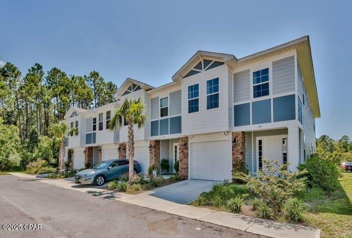 Step into comfort and style in this beautifully designed townhome featuring 10' ceilings on the main level and 9' ceilings upstairs, creating an open and airy feel throughout. The kitchen showcases elegant Bisque cabinets, Giallo Fiesta granite countertops, and durable Weathered Barnwood luxury vinyl flooring, combining both function and beauty.

Enjoy a bright and expansive open-concept living area, perfect for entertaining or relaxing. Upstairs, the luxurious master suite offers a spacious walk-in closet and a stunning en suite bathroom with a high double-sink vanity, relaxing garden tub, and a tiled walk-in shower.

The secondary bedrooms are generously sized and share a well-appointed second full bathroom, providing comfort for family or guests.