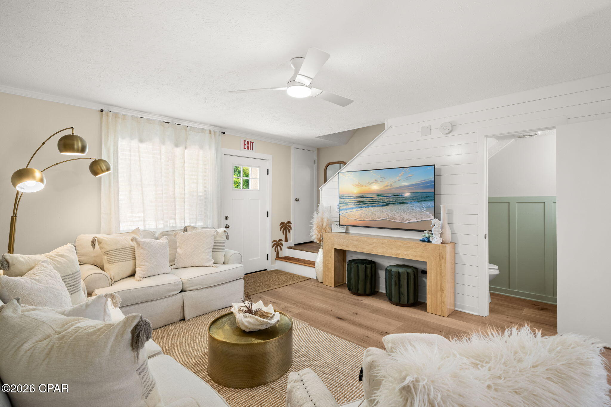 The nicest unit in GHBR! Completely renovated, tastefully furnished, and fully turnkey 2Bd/ 2.5Ba townhome offering 1,092 SqFt in the highly sought-after Gulf Highlands Beach Resort. Unit features new roof (2025), new shaker-style kitchen and bathroom cabinetry with elegant Carrara quartz countertops and backsplash, a large island/breakfast bar, and a new Whirlpool stainless steel appliance package. Additional upgrades include a 2025 water heater, newer HVAC system, fresh interior paint, luxury vinyl plank flooring throughout, hardwood oak stairs, updated trim, shiplap accents, modern lighting, and fully remodeled bathrooms. The laundry area is equipped with a new washer and dryer, and the stylish furnishings and décor make this property completely move-in or rental ready.

Ideally located backing up to heated pool, this townhome also features oversized rear patios with custom pavers, perfect for relaxing or entertaining. Two assigned parking spaces are conveniently located directly in front of the unit. Just a short walk or quick golf cart ride to the beach, this property is situated in Flood Zone X, meaning flood insurance is not required. Low HOA fees and both short- and long-term rental allowances make this an outstanding primary residence, vacation getaway, or income-producing investment.

Gulf Highlands Beach Resort is a gated, golf-cart-friendly community located in the heart of Panama City Beach directly across from the Gulf. Residents and guests enjoy private beach access with a dedicated crosswalk and traffic light, a Gulf-front clubhouse with pool and snack bar, 10 additional pools (five heated), tennis courts, pickle-ball, shuffleboard, an 18-hole mini golf course, playgrounds, fitness center, and conference center--all included in the HOA. Conveniently located near restaurants, shopping, and entertainment, with excellent financing options available including FHA and VA loans. Schedule your private showing today!