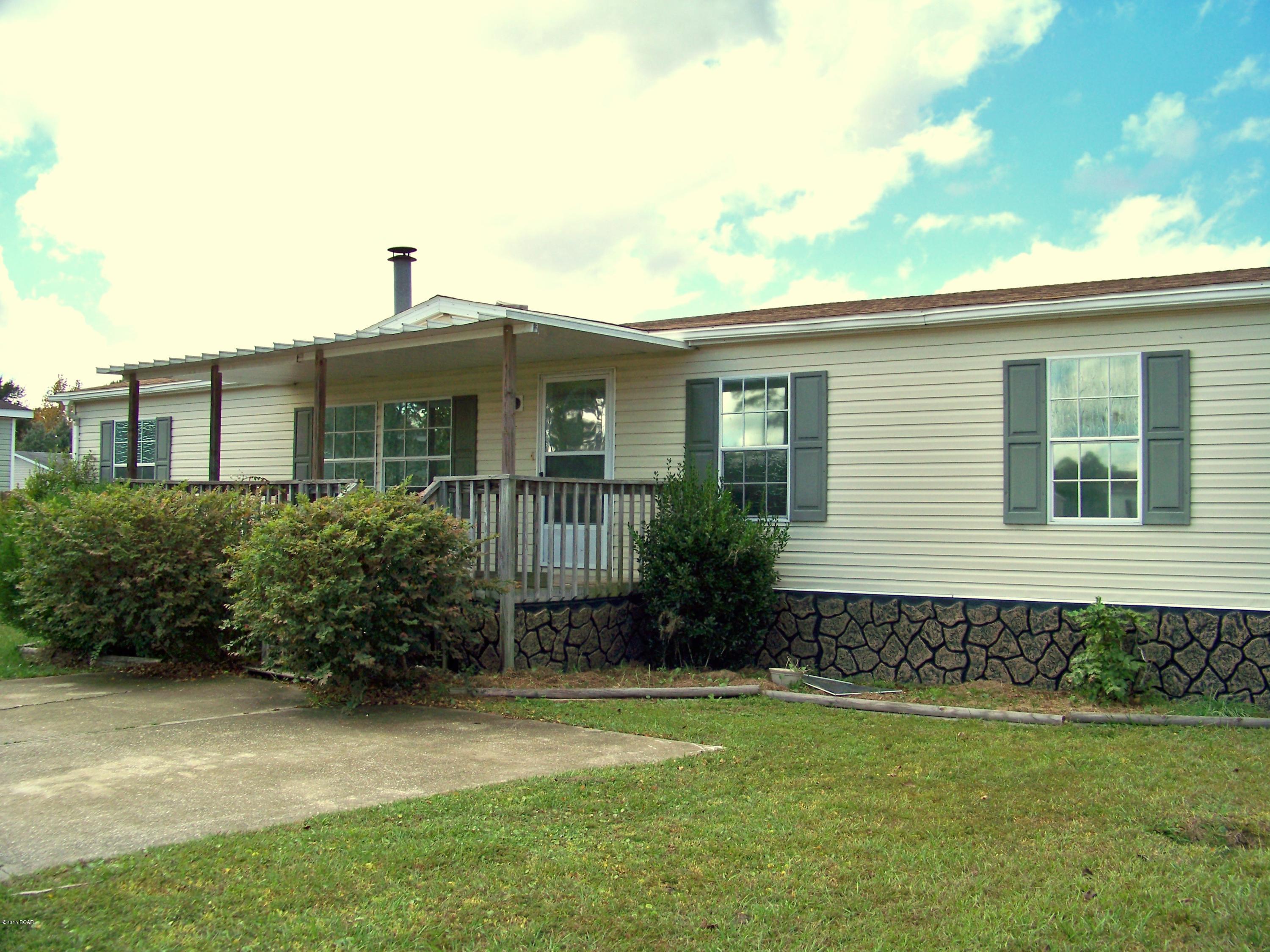 You will have all the space you need in this charming 3 bedroom 2 bath mobile home in Sweetwater Village. Enjoy a cozy fireplace, open floor plan and oversized kitchen with plenty of counter and cabinet space in this quality Jacobsen home located on a quiet cul-de-sac. Close to town, but far enough away to escape the hectic pace. There’s a fenced in back yard for privacy and a welcoming covered porch.  The Master bedroom is large with ample closet space.  You will want t to schedule a showing with your agent today.  All measurement, room sizes and ages are approximate.  Please verify if important.