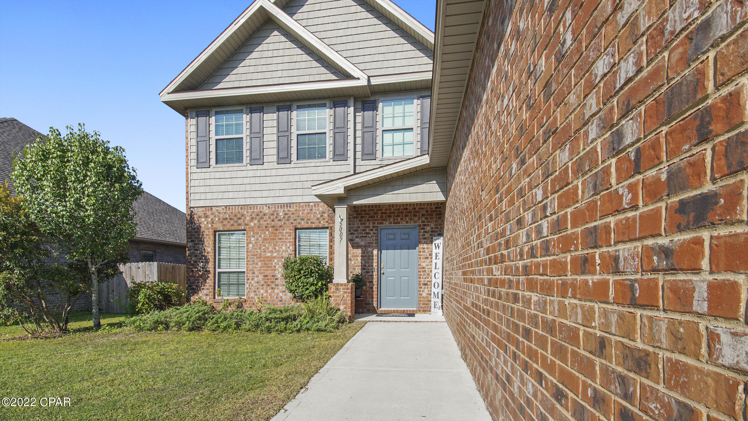 'CURRENTLY UNDER CONTRACT, SELLER WILL CONSIDER BACKUP OFFERS'Sellers will pay $5000 towards buyers rate buy down! What can we say but WOW! This all brick veneer home has 5 LARGE bedrooms/3.5 baths with many extras. There are 2 master suites & 2 living rooms (1 upstairs and 1 down w/ electric fireplace & high 2 story ceiling). Downstairs - LVP & tile flooring, formal dining,  kitchen with eat in breakfast nook, master suite, wet bar & laundry room. Upstairs - Carpet & tile, another master suite w/ full bathroom, hidden bookshelf bedroom & 2 other guest bedrooms with a Jack n Jill bathroom. The kitchen features an island, granite, tiled backsplash, stainless appliances, pantry & breakfast bar. There is crown molding, under stairs pet room, storage, 2 car garage, covered back deck w/ pergola