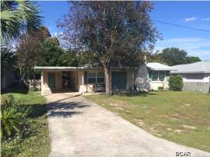 Great 2 bedroom, 2 bath Florida cottage with car port and storage. This home is a short distance to the beach, and includes a fire place, eat in kitchen, wood floors, and open patio. This home is also includes to out buildings/sheds with fenced in yard.