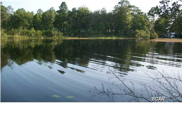 Large Waterfront lot on Deerpoint Lake with over 3/4 acres,(.76 Acres) This long held family land is now available and offers 236 feet of deepwater frontage Convenient location just off Highpoint Road. Paved County road turns into private road. Large pretty oak and magnolia trees and good neighbors help make this a perfect lot to build your dream home on. Underground electric and restrictive covenants help make this appealing as a good lakefront homesite. A deep well and septic tank are required. Fish, boat, and swim in your backyard. Great waterfront.
