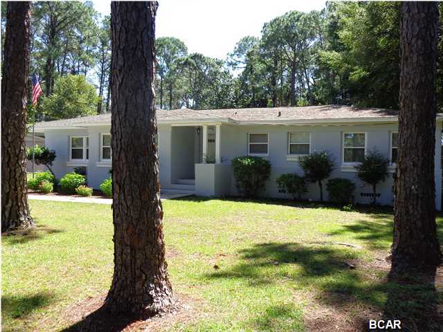 Don't miss the gorgeous Cove home. Completely renovated. The kitchen, sunroom and baths are tiled. The remainder of the house has the original hard wood floors that were refinished last week. They look great. The kitchen has been updated with granite counter tops and all fixtures, (lights and water) are new. The house has been freshly painted, both on the interior and the exterior.. This house has tons of storage. The kitchen has great storage, with a pantry as well as an abundance of cabinets. There is a deck on the back of the house with a hot tub. The back yard features a workshop with water and electric and a boat carport. Do not let this one get by. Make your appointment to see this beautiful home today.