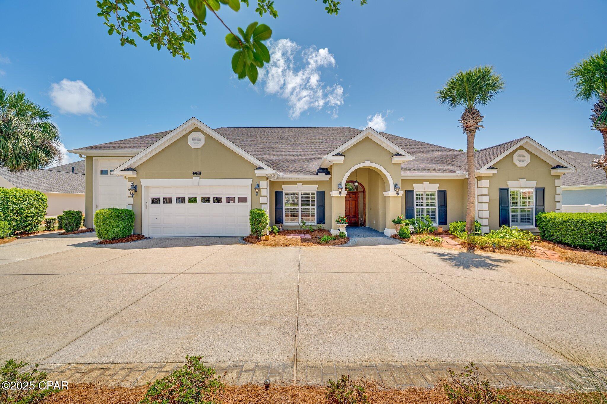 Under Contract - Taking Backups. Experience exceptional living in this custom home located in the prestigious gated community of Bay Point. Perfectly positioned on the 11th hole of the renowned Nicklaus Golf Course, this meticulously maintained residence offers a rare blend of luxury, function, and privacy. Featuring 3 bedrooms, 2.5 bathrooms, and a dedicated office or study that can serve as a fourth bedroom, this home provides flexible space for both living and working.

Step inside to find hardwood floors, raised ceilings, recessed lighting, and a cozy gas fireplace--all integrated with a Control4 smart home system. The spacious kitchen boasts stainless steel appliances, a wet bar, and flows effortlessly into the open living and dining areas, perfect for entertaining. Plantation shutters add charm throughout, and a second-floor bonus room offers extra space for a media room, playroom, or guest retreat.

The expansive master suite overlooks the beautifully landscaped backyard and golf course, with a master bath featuring a double vanity, garden jetted tub, separate shower, and a large walk-in closet connected to a full laundry room with mud sink.

Outdoors, enjoy an oversized screened-in covered patio with tongue and groove ceiling and recessed lighting, leading to a heated swimming pool with a tranquil waterfall. The oversized 180-foot-deep lot allows ample space to relax or entertain.

Car enthusiasts and adventurers will love the standard 2-car garage plus a massive 900 plus square feet heated and cooled motorhome garage--built to house an RV or boat up to 45 feet. This specialty garage includes 30-amp power, sewer clean out, ventilation, and a workshop area.

Additional features include a full-house generator, 16-camera security system, and the peace of mind that comes with living in one of Panama City Beach's most sought-after gated communities. This is Bay Point living at its finest.