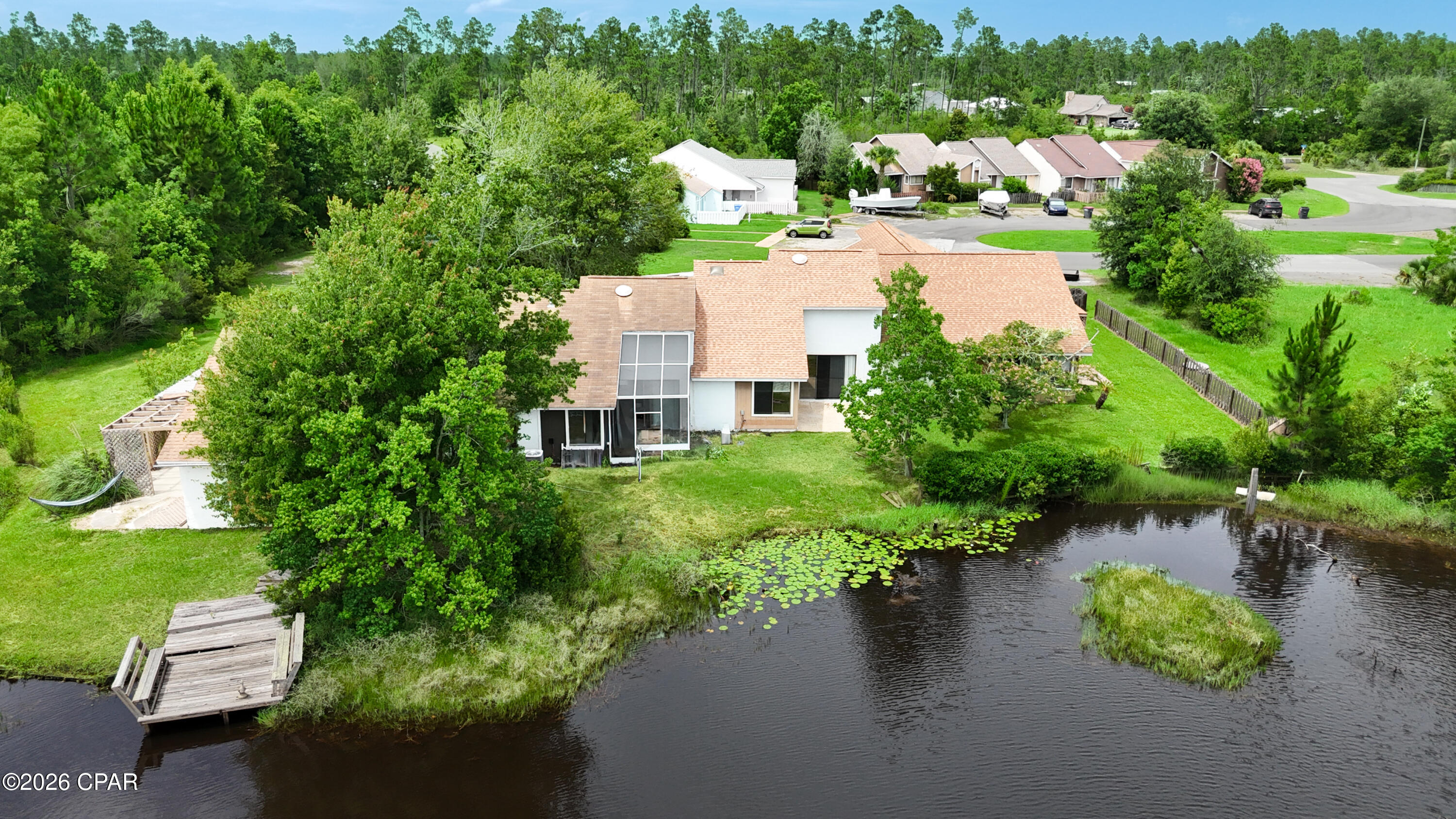 12030 Raintree Dr, Unit C is a fully renovated unit with all new stainless steel appliances, setting the foundation for a modern kitchen. It offers comfortable living with 2 bedrooms and 2 baths, perfect for anyone looking for a place in a peaceful community. The unit is situated on a beautiful pond in a well maintained setting with a fair HOA of just $400 annually. This move in ready home is located near Fort Wayne, so you're not far from shopping, dining, or entertainment. It stands out as an ideal option for anyone looking to own a waterfront style home in Lakeview Villages.