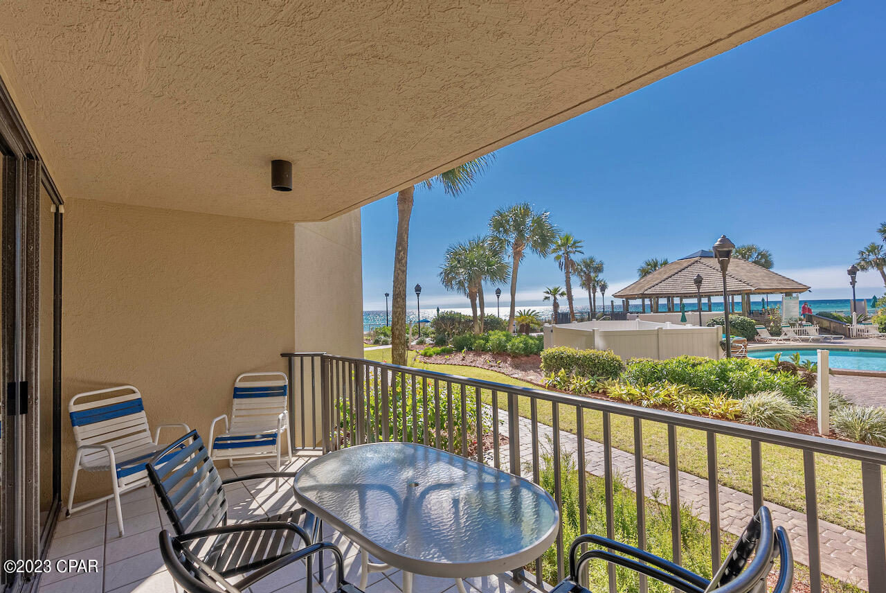 Highly sought after ground floor unit in an awesome location. Pull right up to the front door to unload and nearby parking. Walk out the back door to a nice patio and gate out to the beach and pool front. Summerhouse Condo has a lot to offer in amenities and is a great location. This condo is a great vacation rental and books easily due to being ground floor. This unit will not last long on the market. Buy now and get all the summer income. Buyer to verify all information.

Updated Kitchen and Baths with Cherry Cabinets and Granite countertops. 

Excellent rental at approx. $60,000 per year. There are summer bookings the seller is willing to transfer.