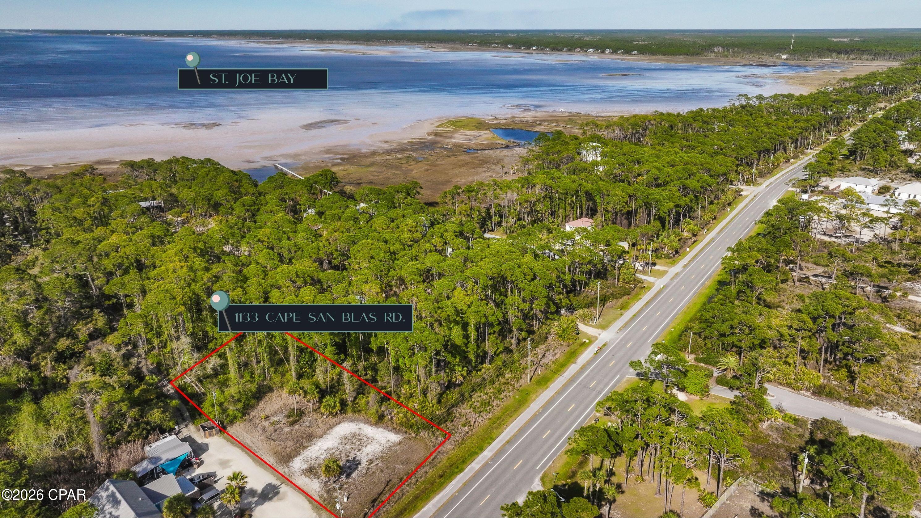 Ready to build your dream home at the beach? This 0.51-acre bayside lot on South Cape San Blas offers the perfect blend of nature, relaxation, and coastal adventure with 5 feet deeded bay access. Located 1st tier from the bay, this property offers the potential for beautiful bay views and is zoned Mixed Use, giving you flexibility for future possibilities. Surrounded by towering pines and lush native vegetation, you'll feel immersed in the natural beauty that makes Cape San Blas so unique. Best of all--there's no HOA, giving you the freedom to design the coastal escape you've always imagined. Just minutes away, Salinas Park offers kayaking, fishing, pickleball courts, playgrounds, and easy bay access. Spend your days biking scenic trails, relaxing on the pet-friendly Gulf beaches, or exploring nearby Historic Port St. Joe for dining and shopping. Whether you're a nature lover, outdoor enthusiast, or savvy investor, this homesite is your chance to become part of the laid-back Cape San Blas lifestyle.