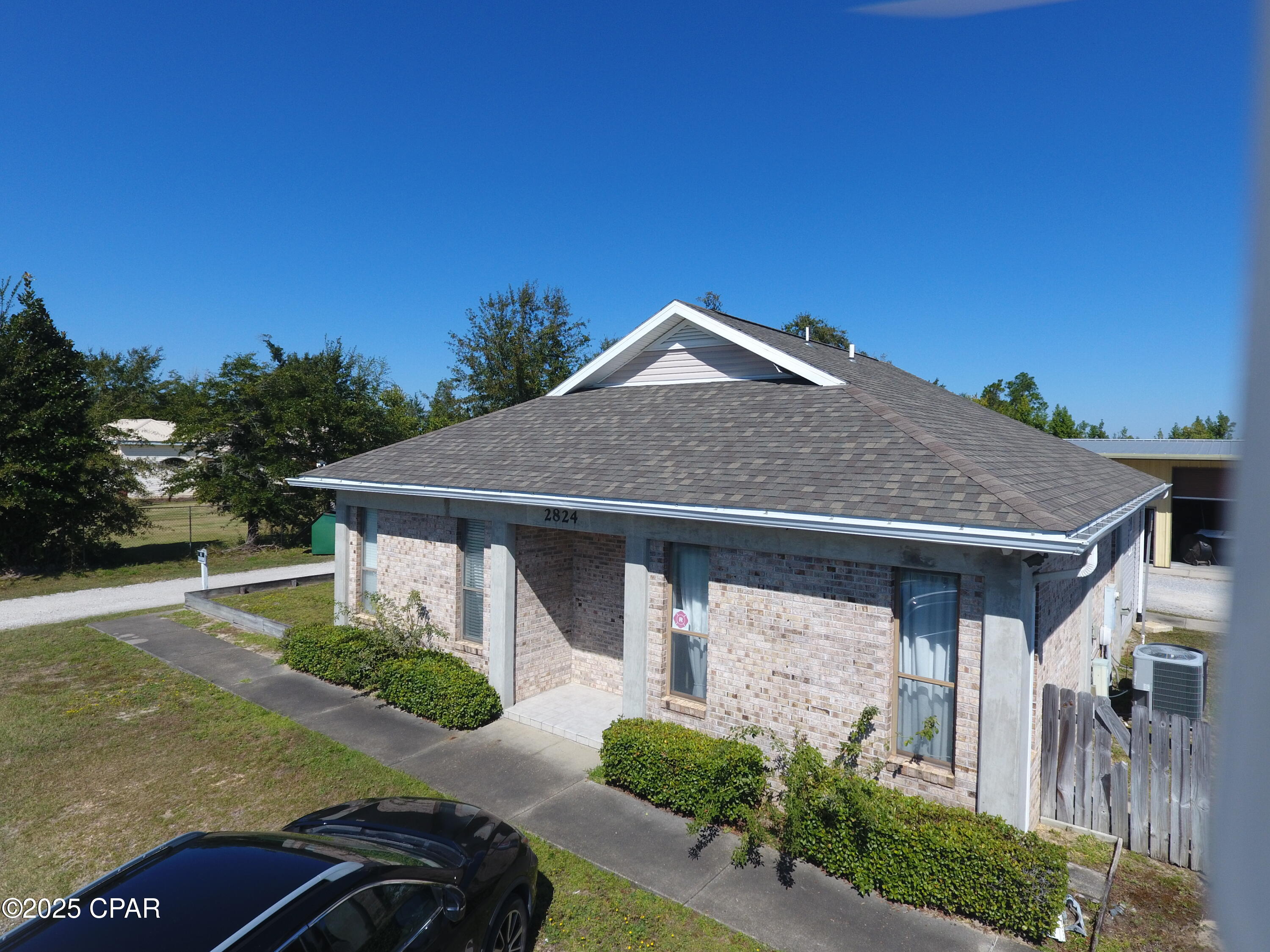 2824 Highway 2321 is a well-designed commercial property with two buildings building located on ±0.92 acres in northern Bay County. The first building consists of approximately 1,630 square feet of office space including: 4 large private offices, a spacious foyer/welcome area, conference room, coffee bar with sink, technology or IT room, and more.  This building can be leased separately not including warehouse at $1,600 per month NNN. 

The +/- 4,500 square foot warehouse includes: 4-12' x12' roll up doors, 14'-16' clear ceiling height, spray foam insulation, and 110 /220V power with the possibility to increasing to 3 phase power if necessary. The warehouse space can be leased separately for $3,000 NNN per month.

The property is zoned C-3A General Commercial Low use, allowing a variety of retail, office, service-related businesses and some light manufacturing. 

Please call agent for showing instructions.