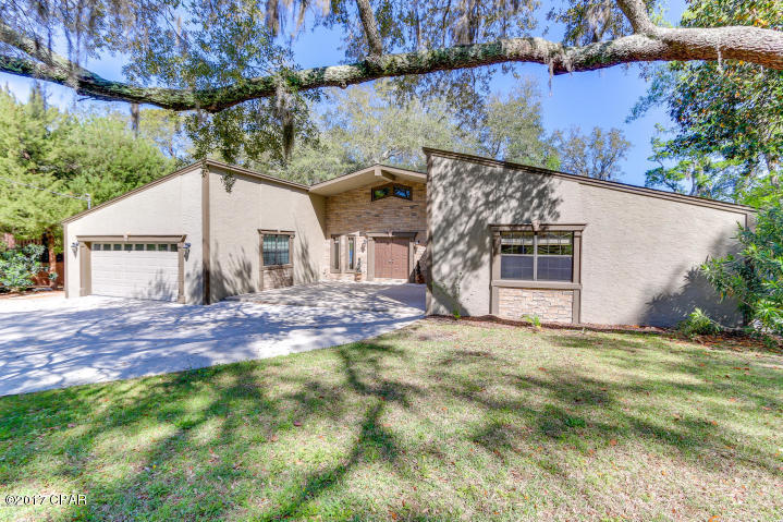 This amazing 4 bedroom, 2 bath, plus an office/Florida room has more than 2,400 square feet and is breathtaking the moment you pull up. Located in the very popular Lakewood subdivision you're not only in a great neighborhood but you're also on a beautiful large .9 acre lot with more than 240 ft. on the water. This home is like new and the features throughout are endless. You won't believe just how great they are until you see it in person. Just a few of the upgrades include: Custom kitchen from top to bottom with high-end appliances, hardwood floors and new carpet, tiled showers, gas fireplace, a Rinnai tank-less water heater, sprinkler system, AC less than 5 years old, oversized driveway perfect for your boat and/or RV, a 24x21 deck off of your living room with French doors.  The mature oak trees and magnificent views of this 125 acre lake with leave you speechless. New Copper metal roof. INCLUDED is the lawn service and pest control. NO PETS AND NO SMOKING NO EXCEPTIONS!  Lease term will expire on September 15, 2018.  Looking for a good 6 - 9 month term.