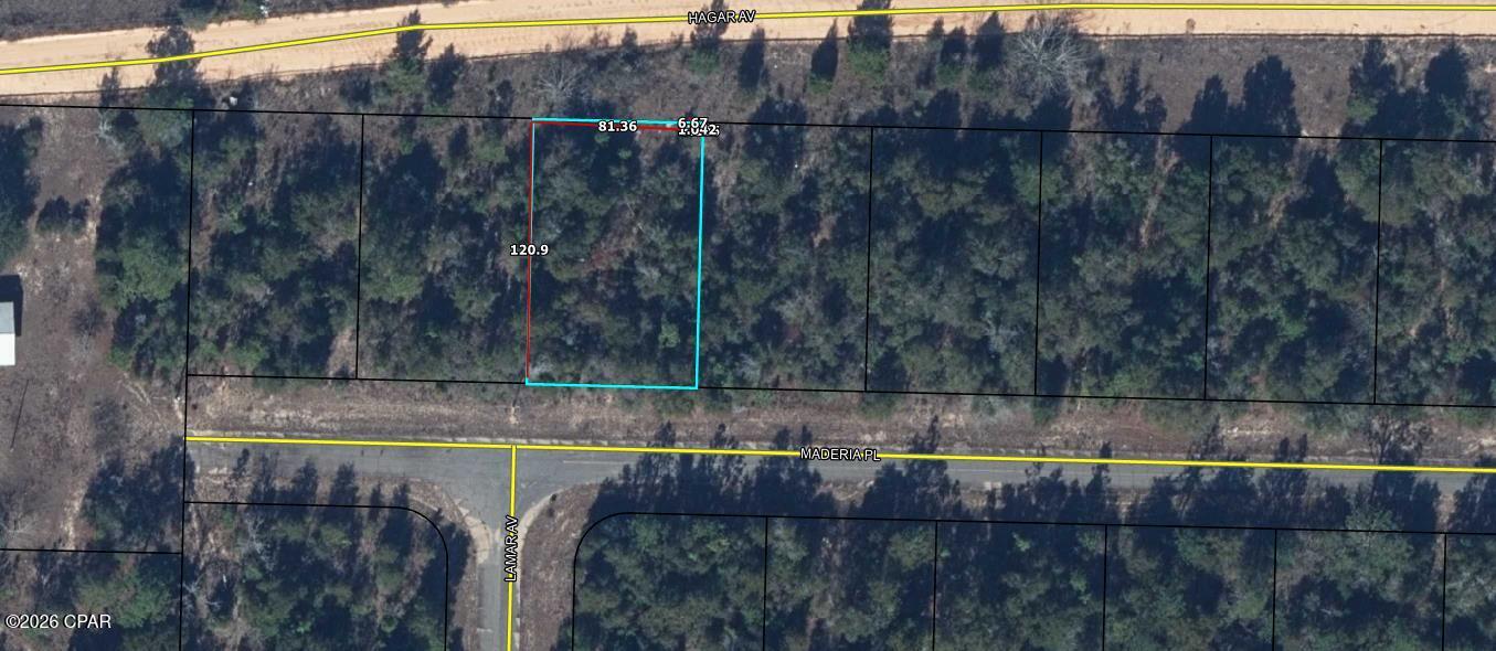 Near Hwy 77.  In the heart of new building area.  Beautiful lot waiting for someone to join the Sunny Hills area!