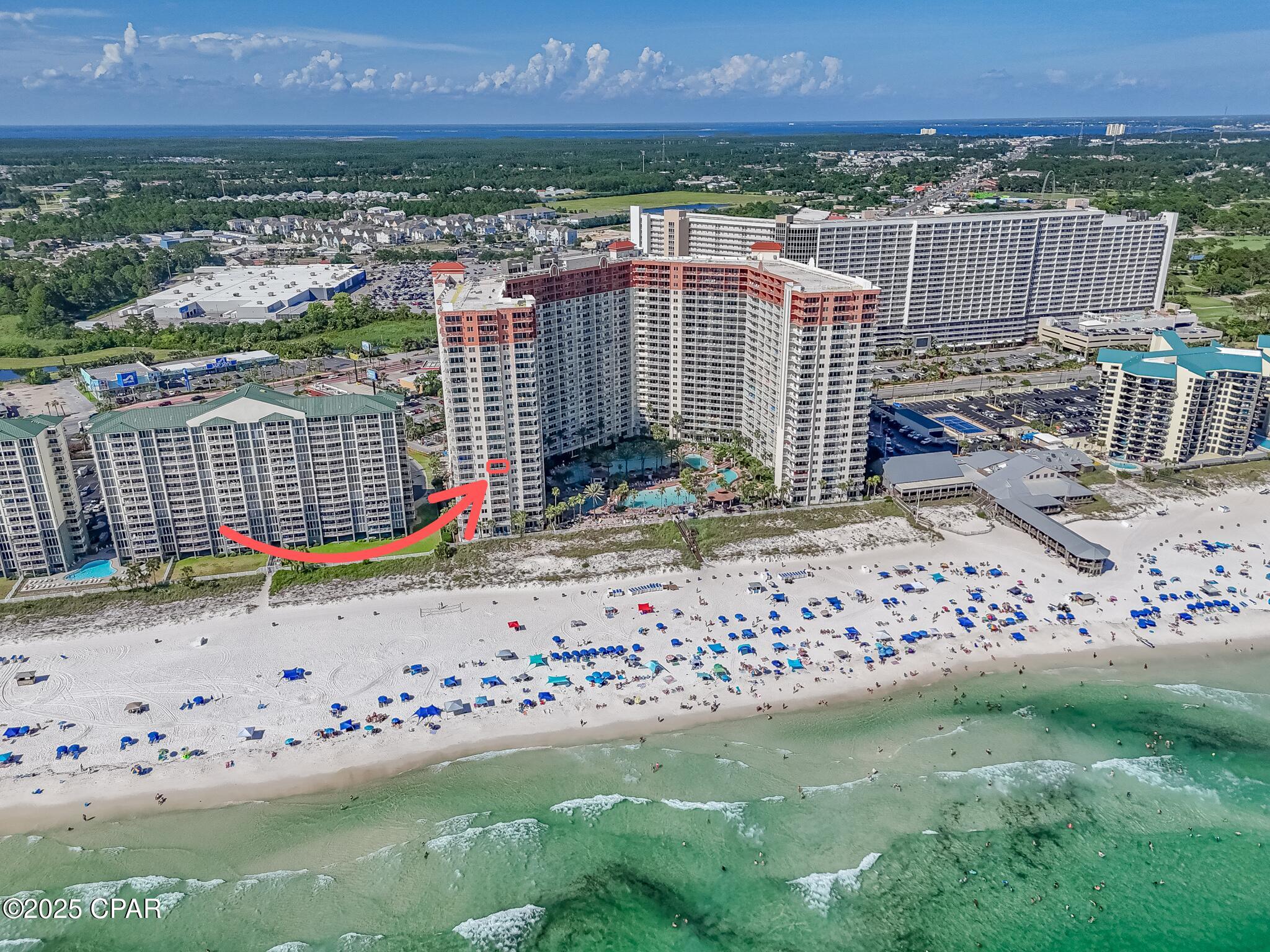 Welcome to Unit 802 at Shores of Panama, a rare Gulf front end unit offering fully unobstructed views of the Gulf. Located on the 8th floor, this condo INCLUDES A RARE DEEDED PARKING SPACE on the same level as the skybridge walkover--making access seamless without the wait for elevators. This turnkey, rental-ready condo features a spacious one-bedroom layout plus a private bunk room with its own full bathroom, providing ideal accommodations for guests or family. The unit is fully furnished and tastefully decorated, with a well-equipped kitchen and a private balcony perfectly positioned for enjoying the sunsets over the Gulf. Shores of Panama is known for its impressive amenities, including a massive lagoon-style beachfront pool, an indoor heated pool, hot tub, on-site tiki bars (seasonal), coffee shop, fitness center, and 24/7 security. Perfectly situated next to Pineapple Willy's and within walking distance to dining, shopping, and entertainment--with a grocery store conveniently located across the street--this unit has a solid short-term rental history and offers exceptional value whether you're looking for a personal getaway or an income-producing property.